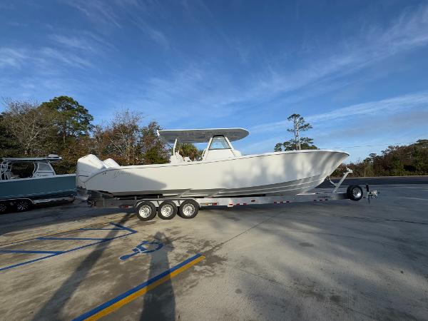 2025 Yellowfin 39 Offshore boat on a trailer in a parking lot.