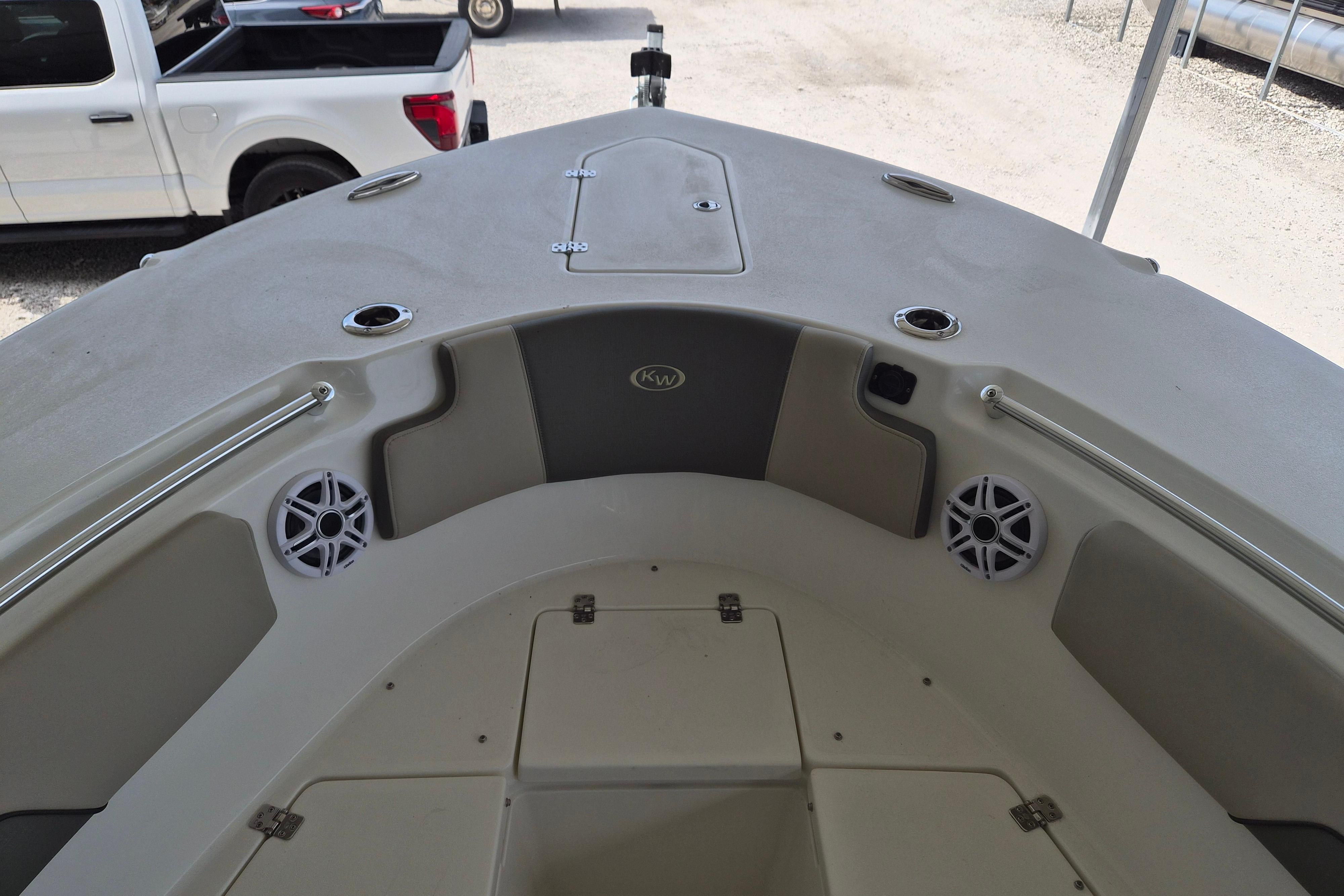 2026 Key West 260 Center Console boat interior with speakers and storage compartments.