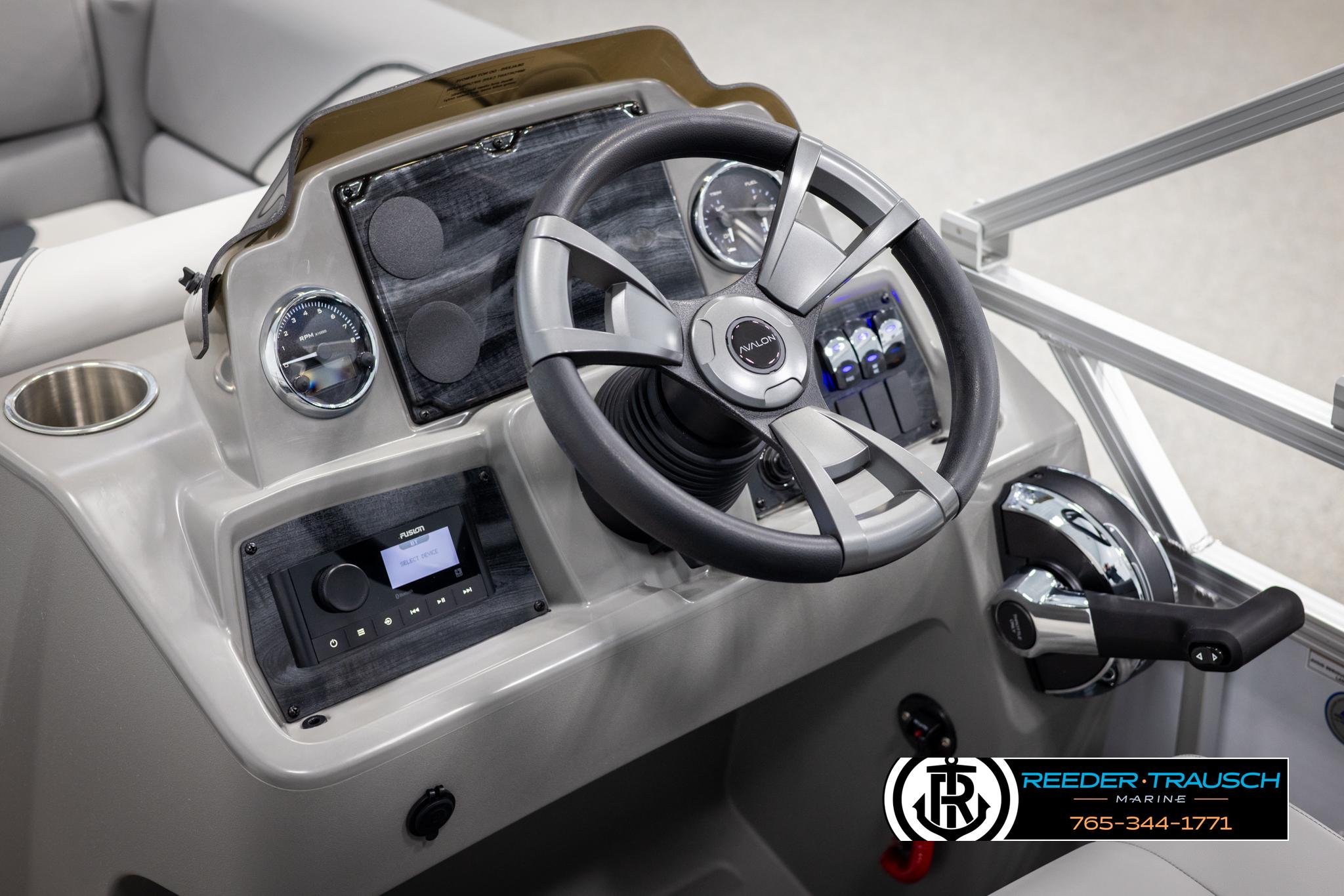 Steering console of 2025 Avalon VEN CR boat with modern controls and gauges.