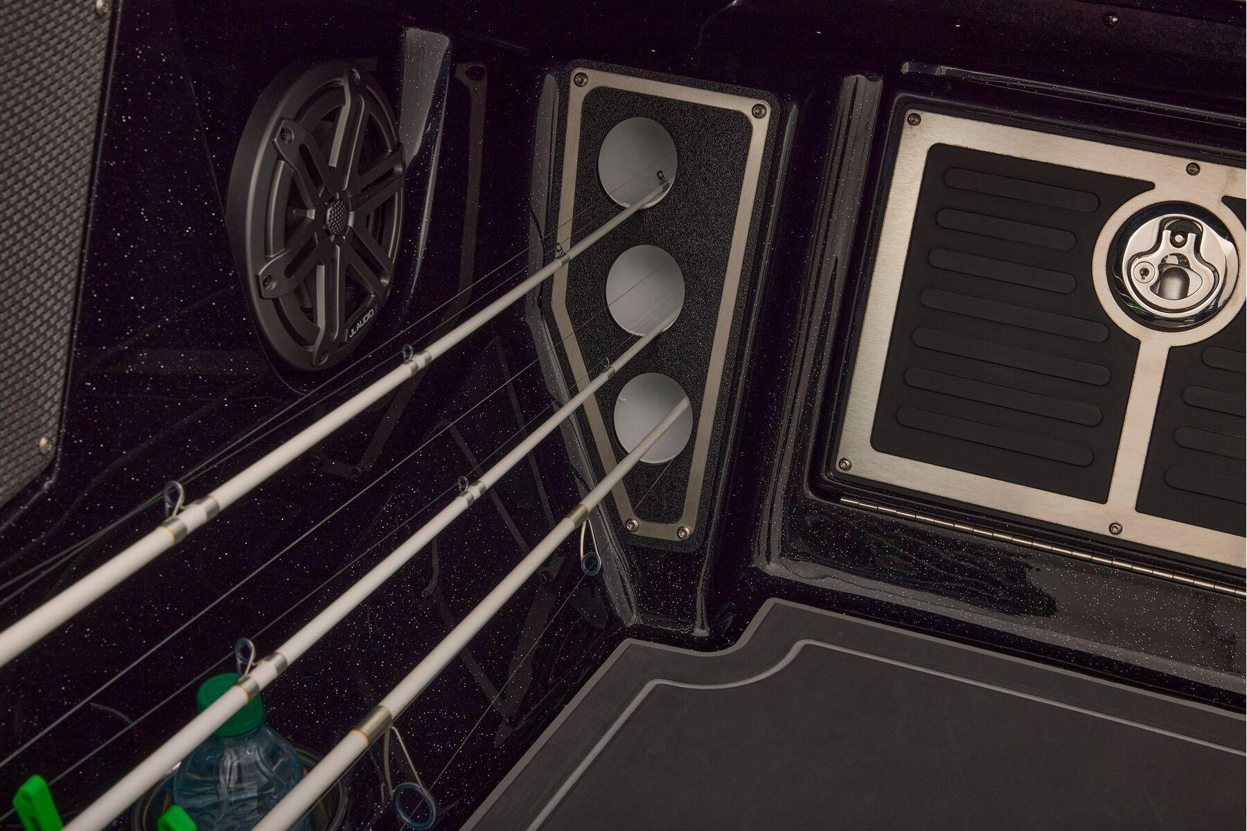 Manufacturer Provided Image: Interior of 2026 Ranger 620xFS Pro boat with fishing rod holders and speaker.