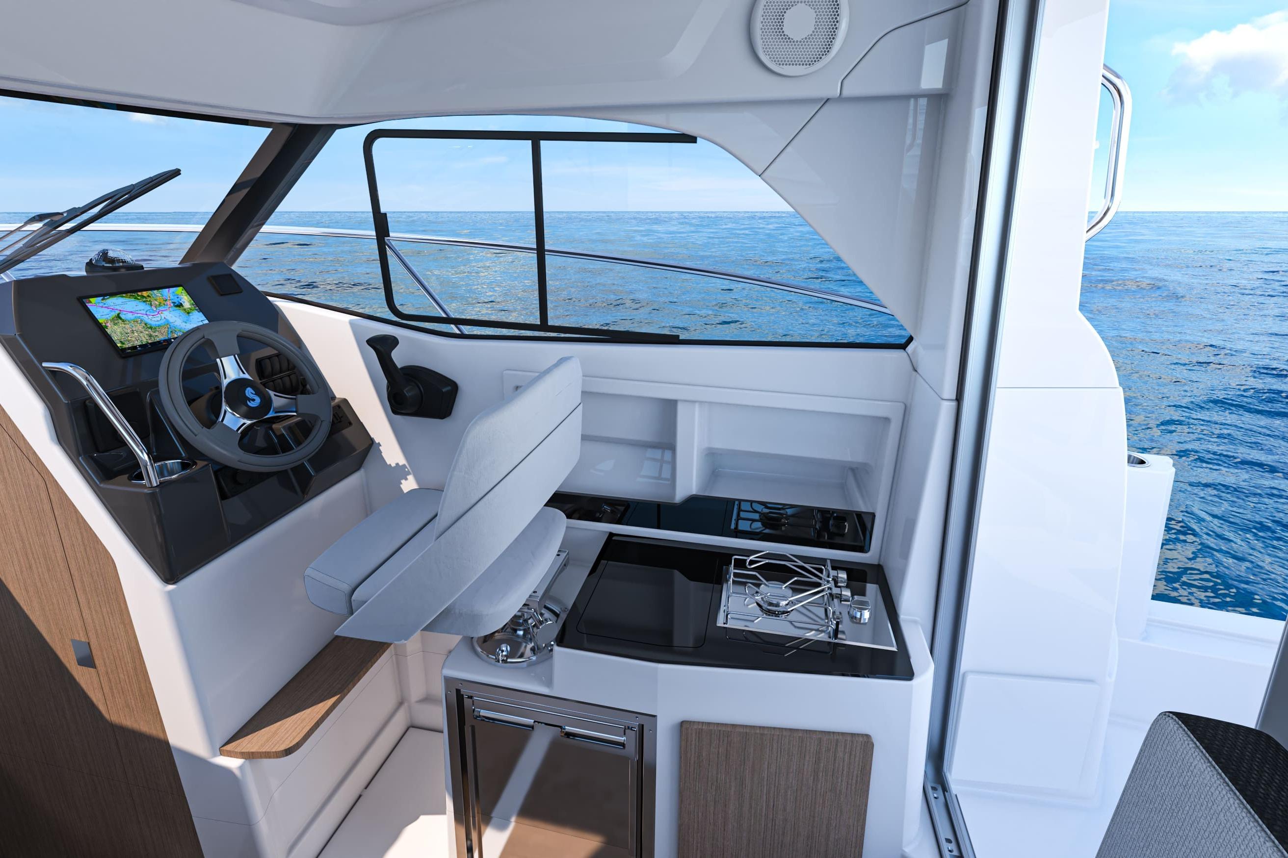 Interior of 2026 Beneteau Antares 7 with helm and ocean view.