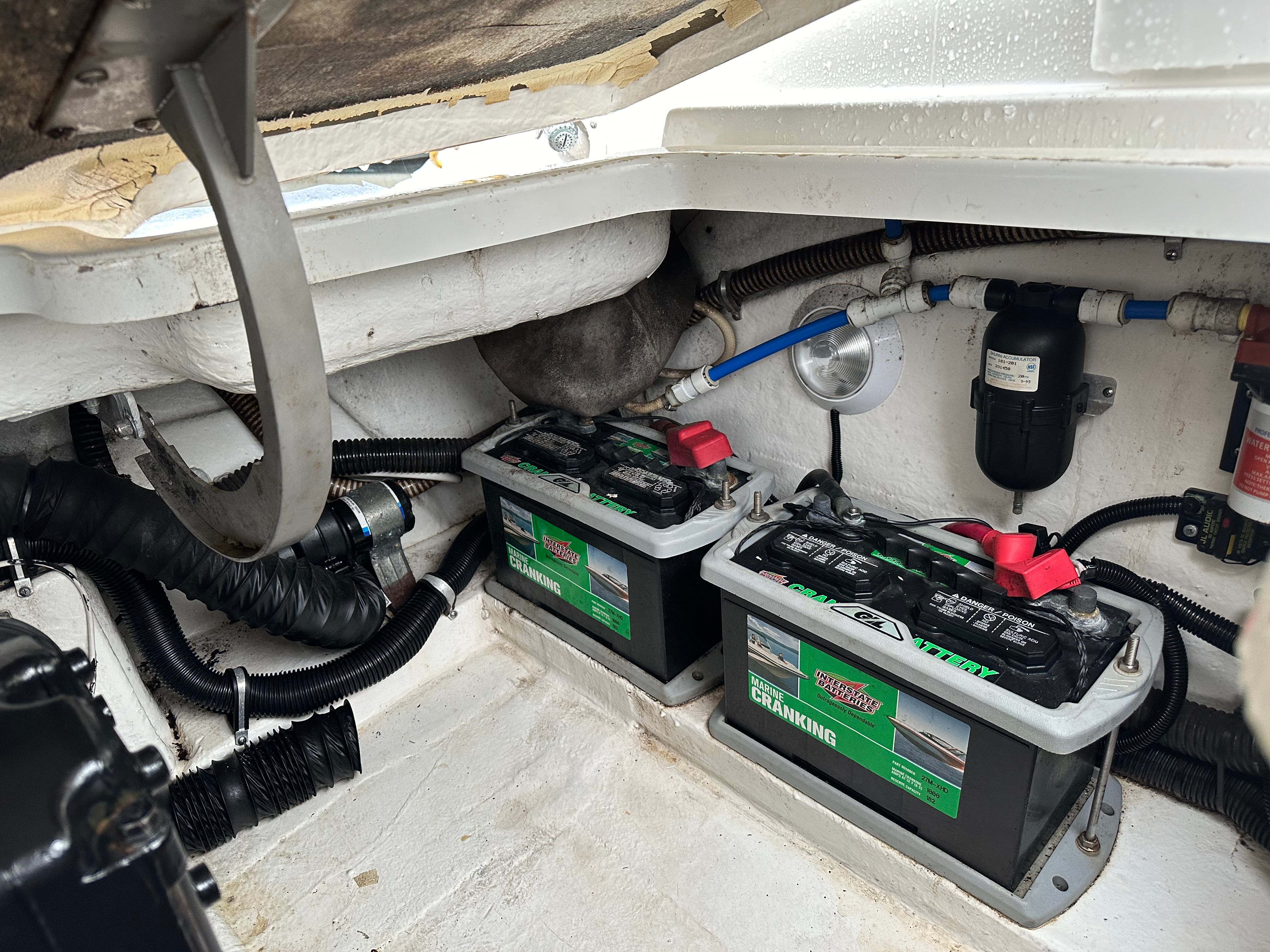 Batteries in the engine compartment of a 2000 Formula 260 Sun Sport boat.