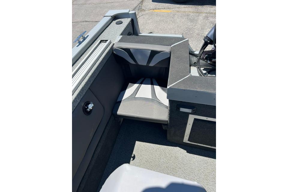 2023 Starweld Fusion 18 DC boat interior with gray seating and storage compartments.