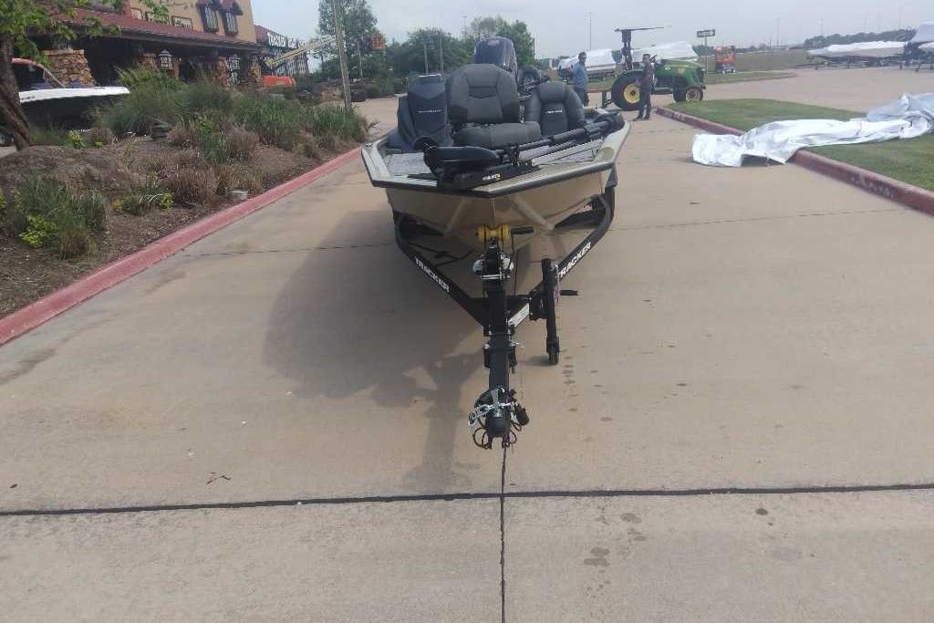 2026 Tracker Pro Team 190 boat on trailer in outdoor setting.