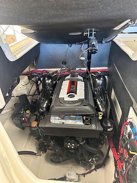 2022 Sea Ray SLX 280 engine compartment showcasing powerful marine engine.
