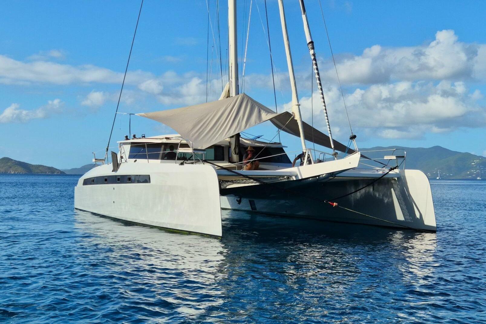 Luxury Alibi 54 catamaran sailing in clear blue waters, 2016 model.