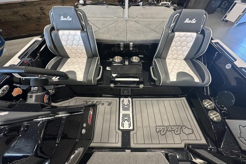 2026 Bass Cat Lynx STS interior with dual seats and modern dashboard design.