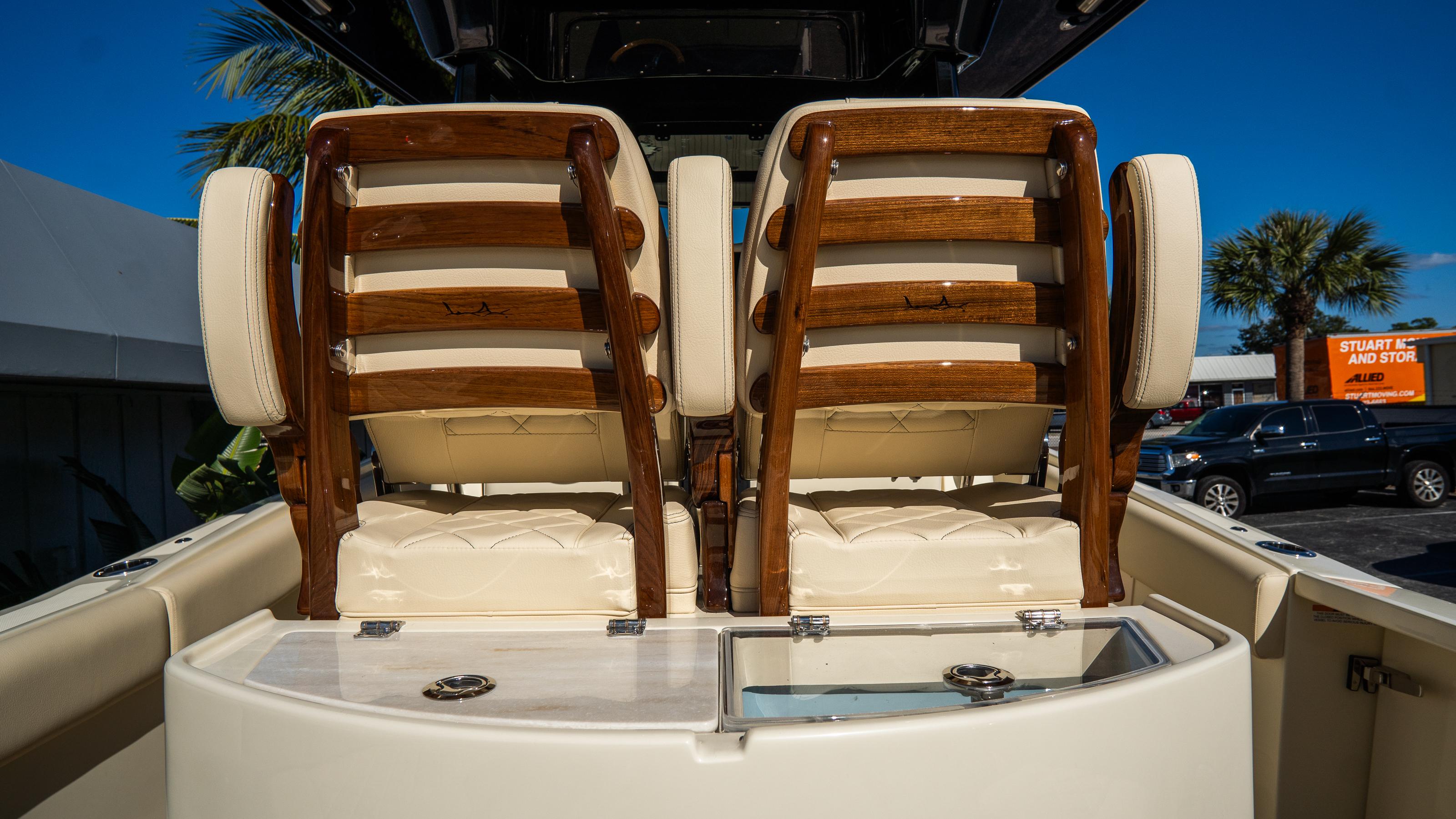 2025 Chris-Craft Catalina 30 boat seats with elegant wooden accents and luxurious design.