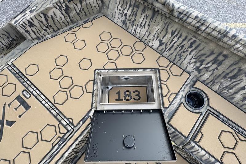 Excel 183 Tomahawk 2026 boat interior with hexagonal pattern design.