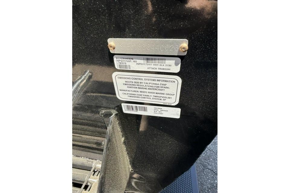 2026 Tracker Pro Guide V-175 WT emissions control information plate on black surface.