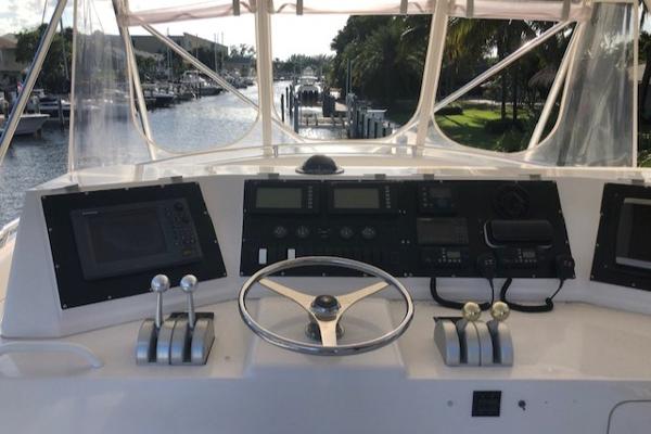 1997 Bertram Convertible boat helm with navigation instruments and controls.
