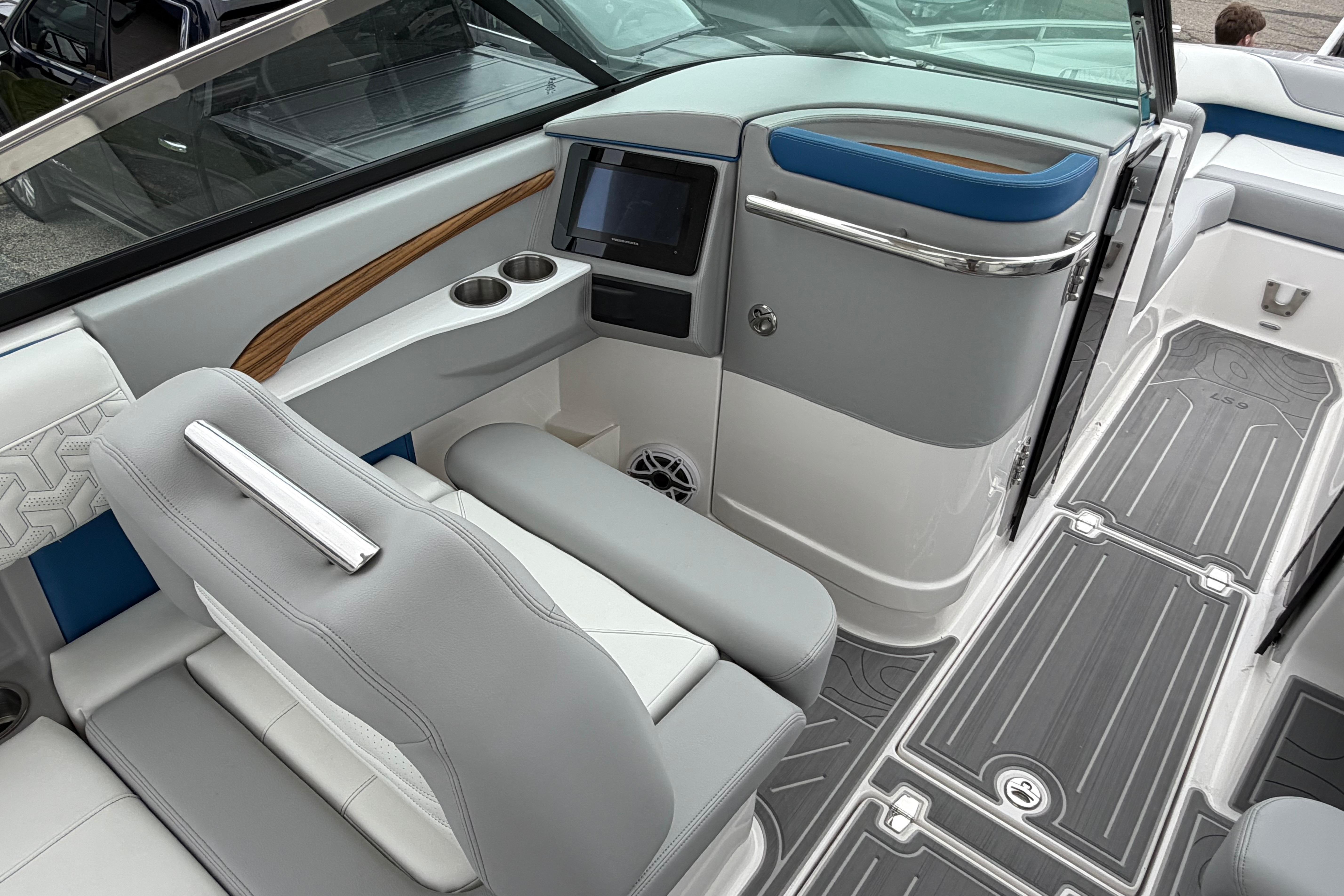 2026 Regal LS9 Surf boat interior with modern seating and sleek dashboard design.