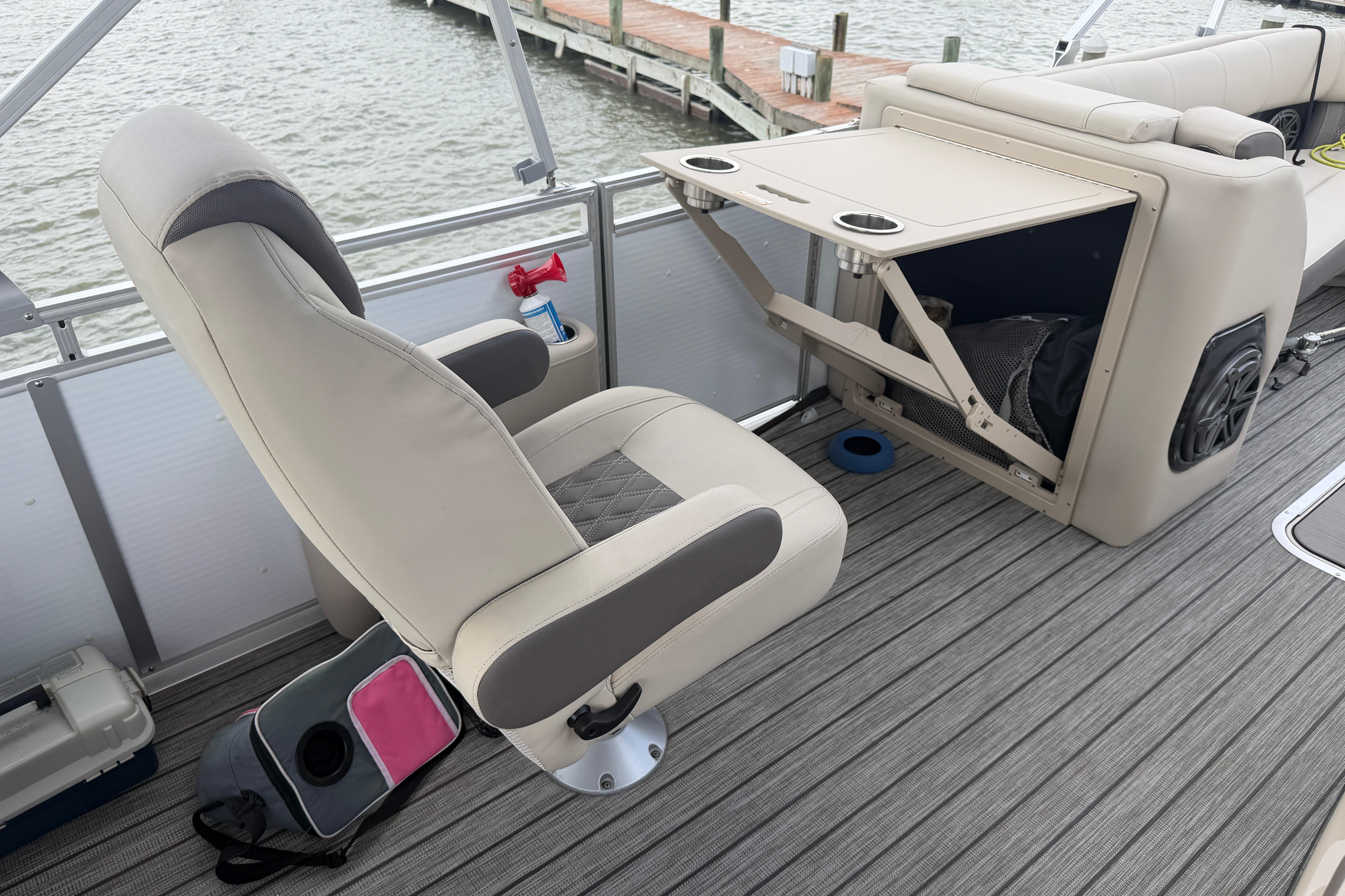 2022 Harris FloteBote Solstice 250 interior with seating and storage features.