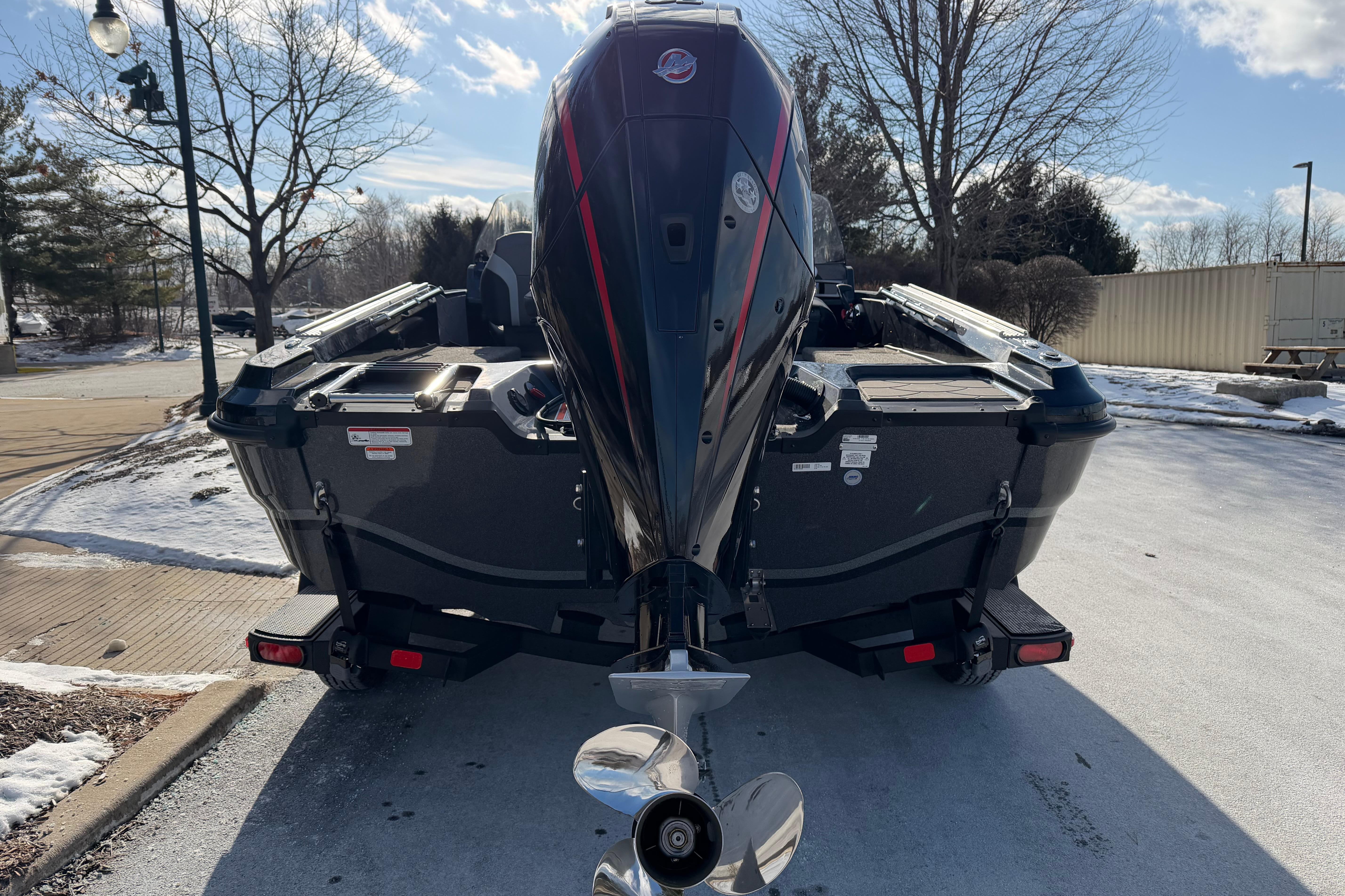 Rear view of a 2026 Nitro ZV20 boat on a snowy driveway.