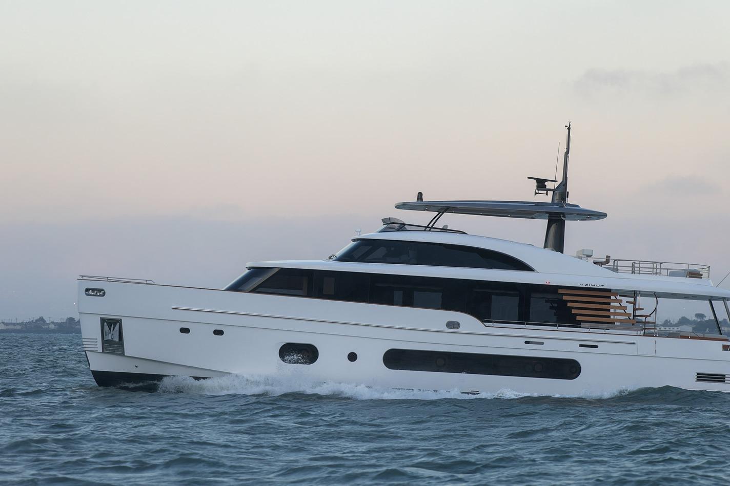 2026 Azimut Magellano 25M yacht cruising on open water at sunset.