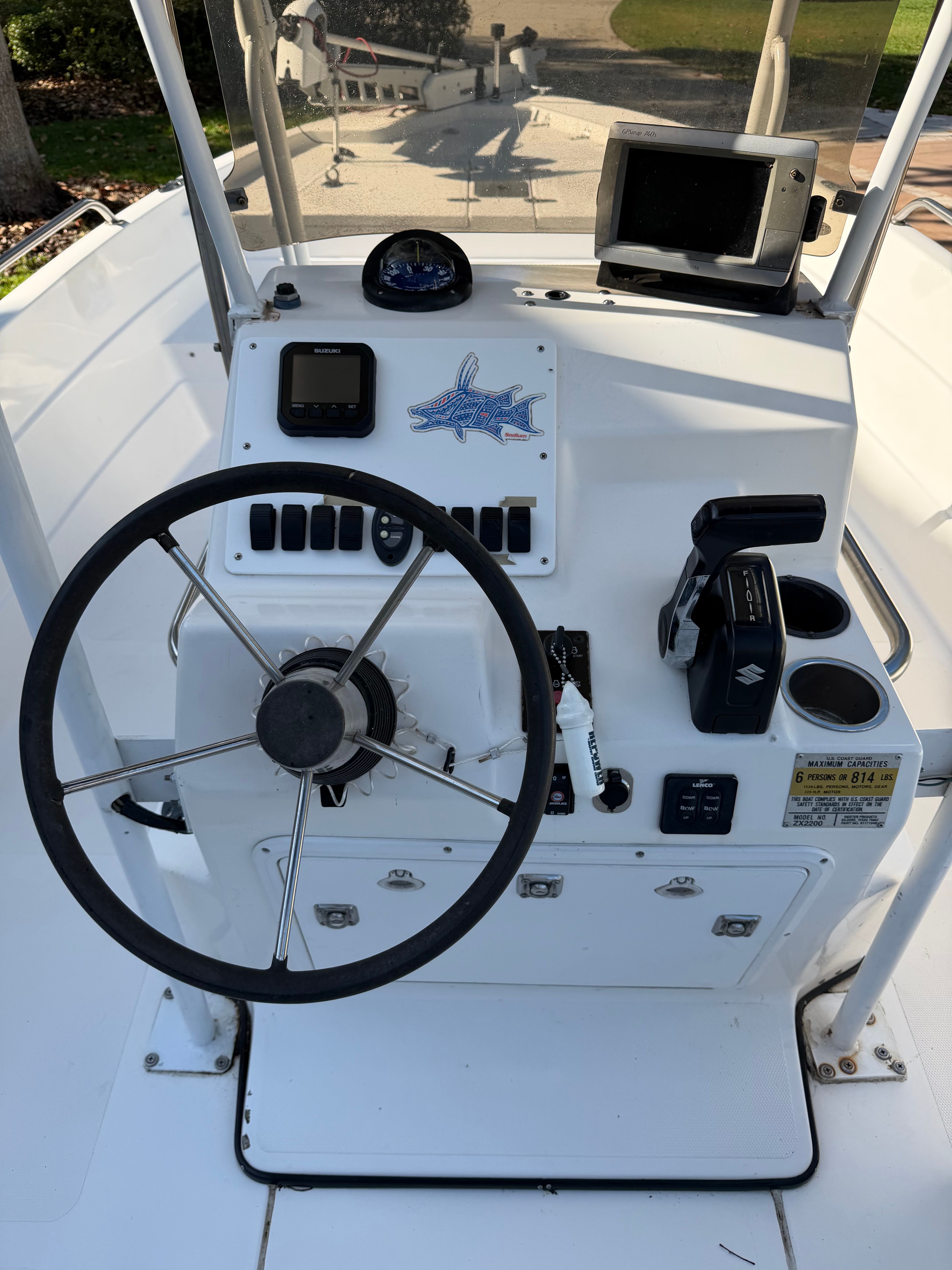 1999 Skeeter ZX2200 boat console with steering wheel and instruments.