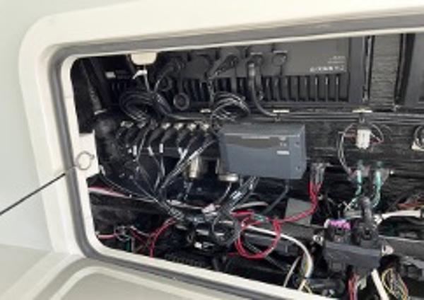 Electrical wiring inside a 2022 Yellowfin 39 Offshore boat compartment.
