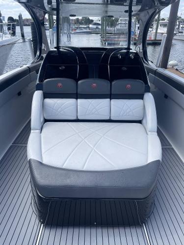 2017 Mystic Powerboats M4200 interior seating with waterfront view.
