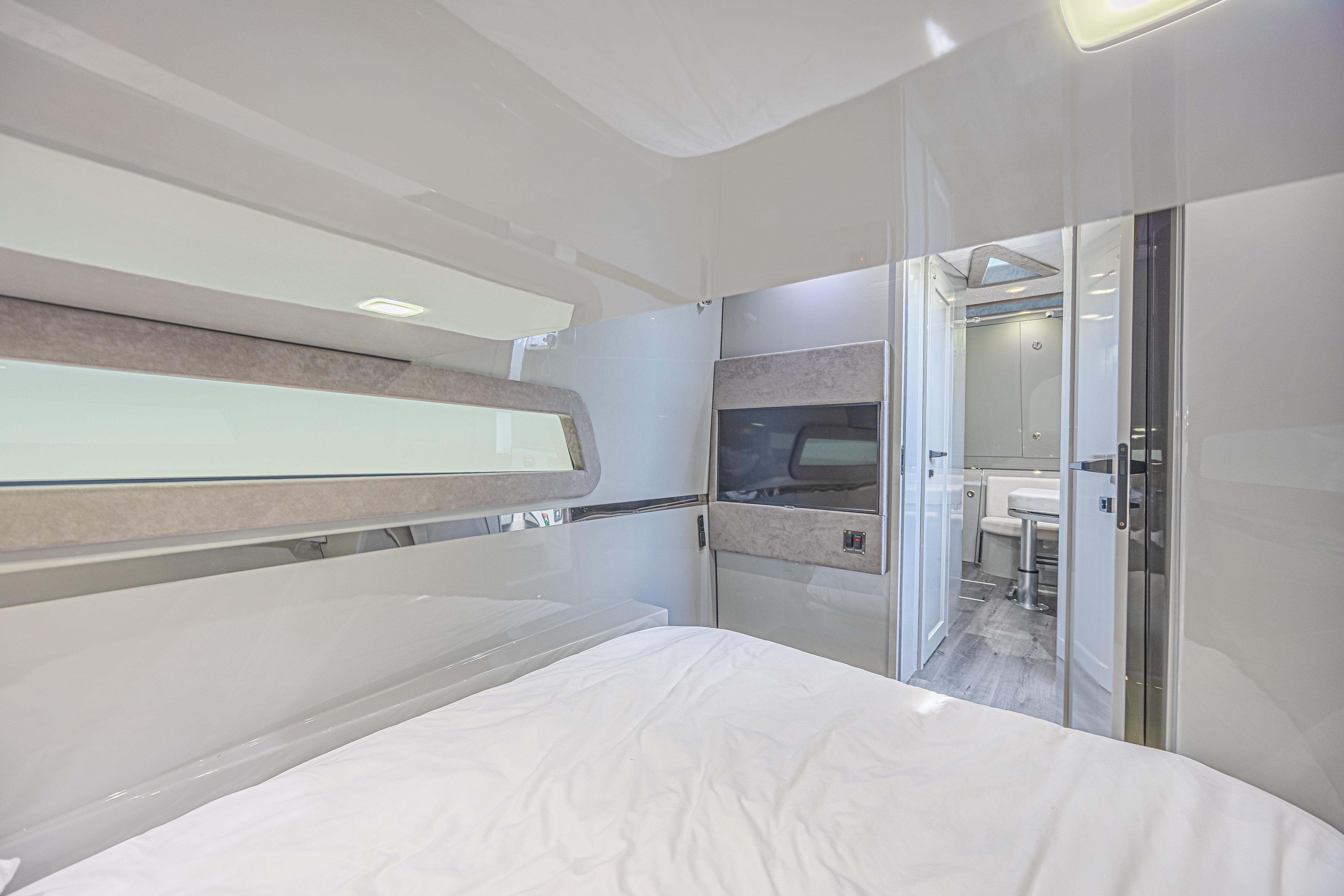 Luxurious interior of 2025 Midnight Express 52 Vitesse yacht with modern amenities.