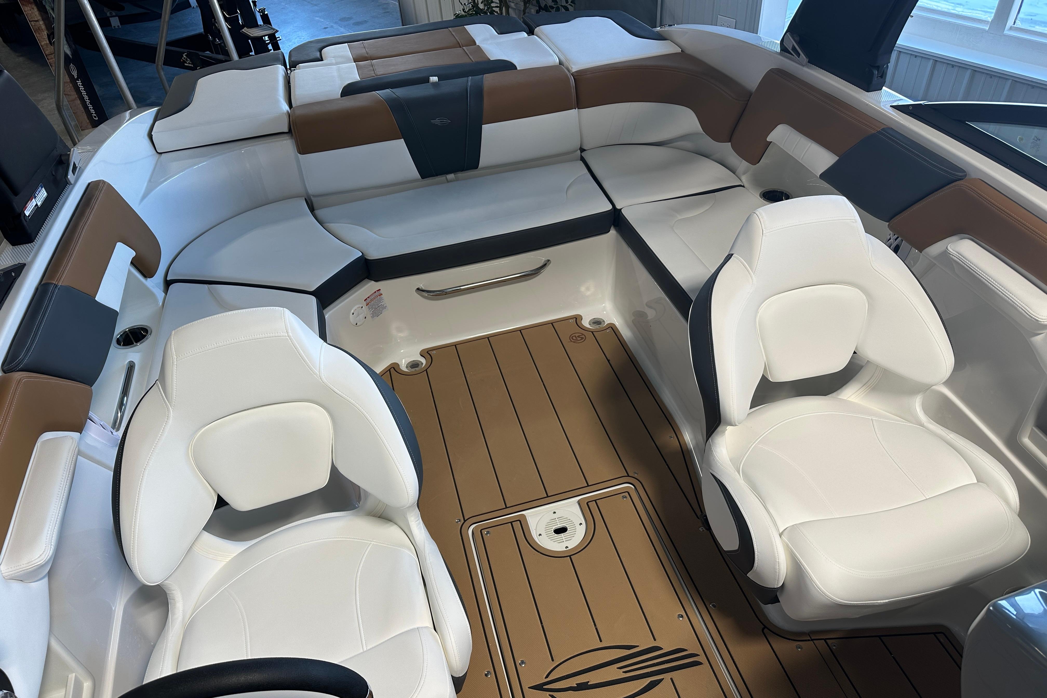 Interior of 2026 Chaparral 23 SSi with luxurious white seating.