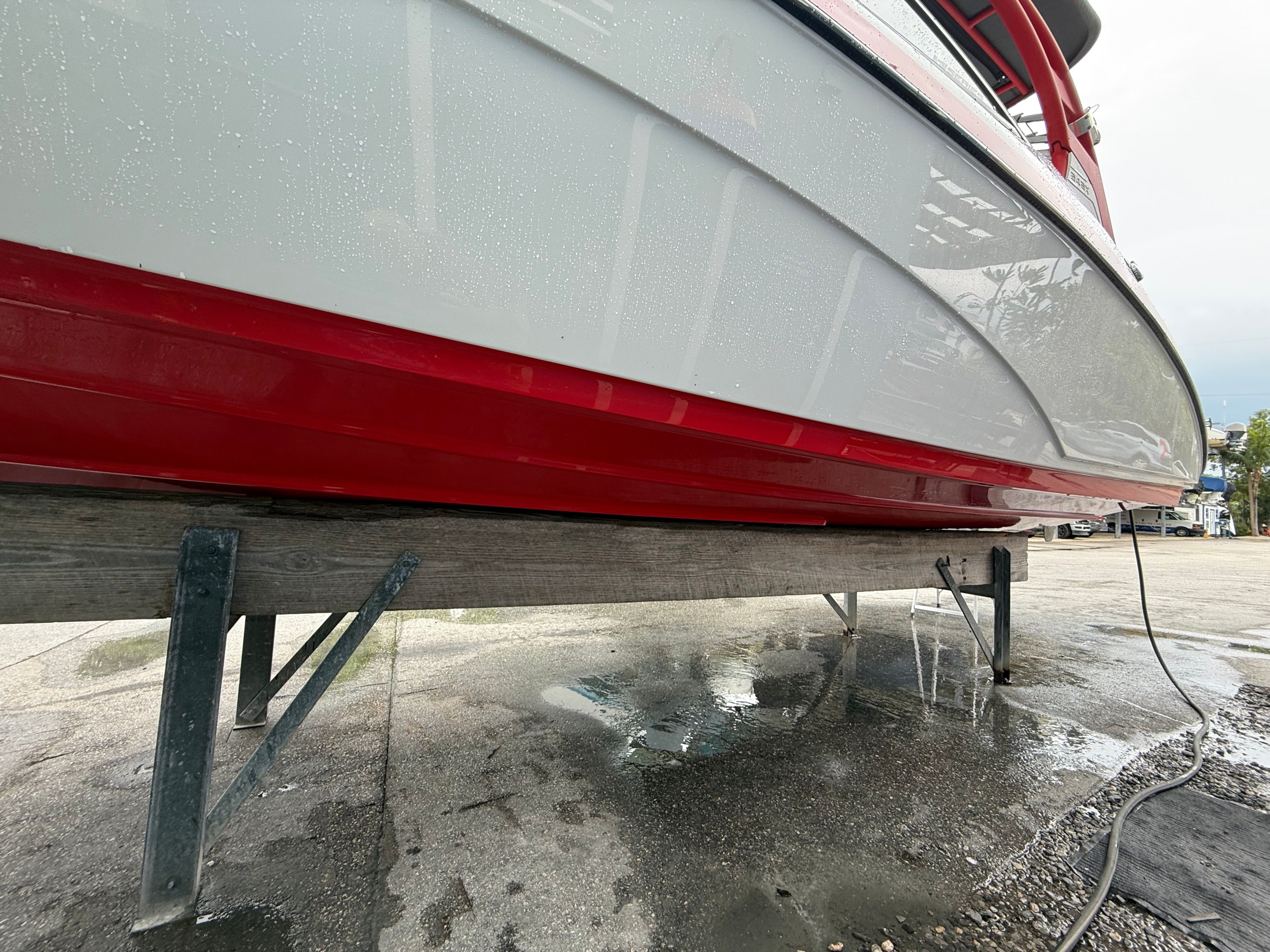 Yamaha AR242X 2020 boat on stand, close-up of hull.