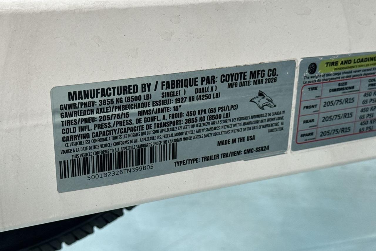 A label on a boat displays technical specifications and manufacturing details.