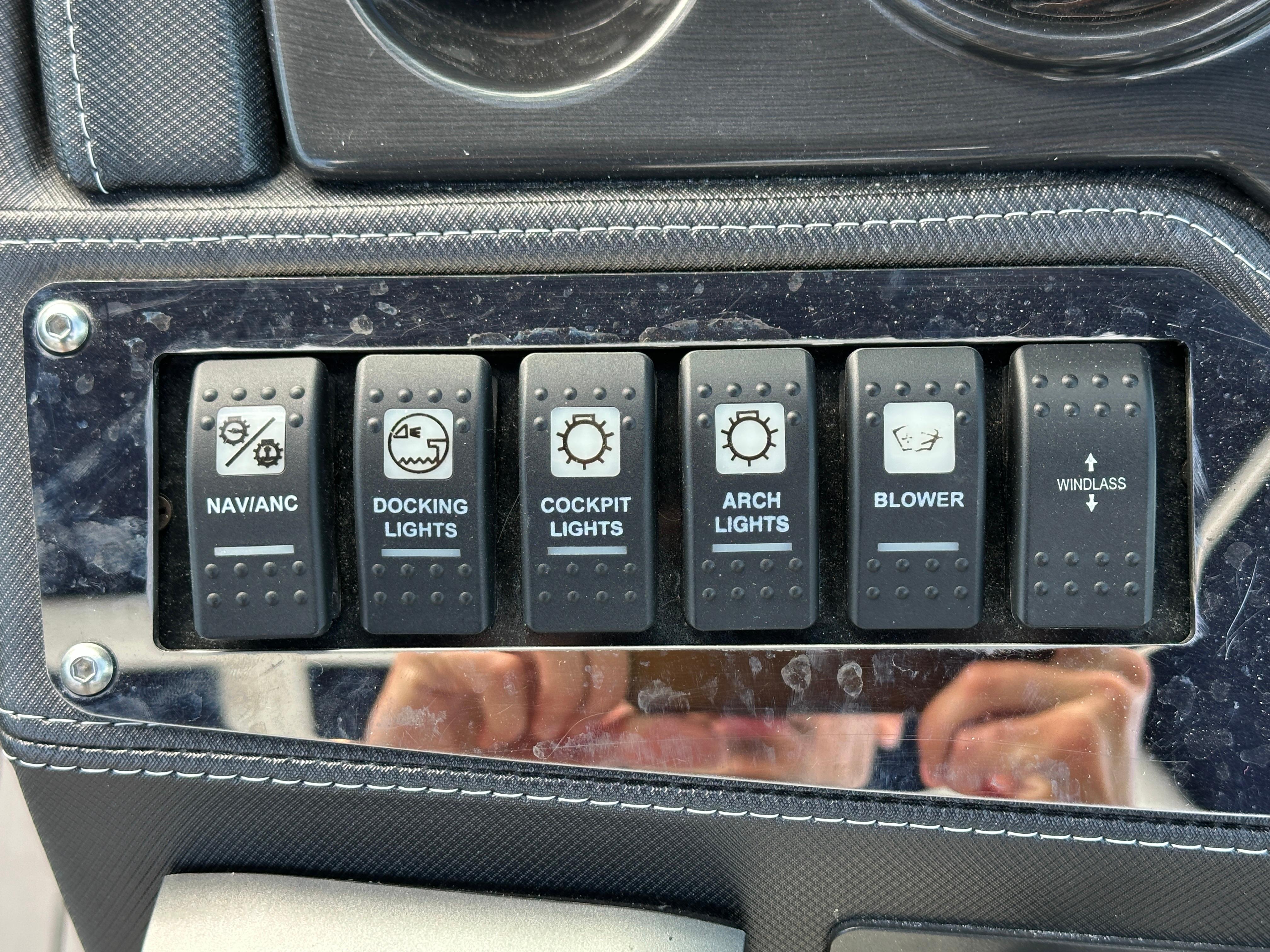 Control panel of a 2014 Monterey 268 Super Sport boat with labeled switches.