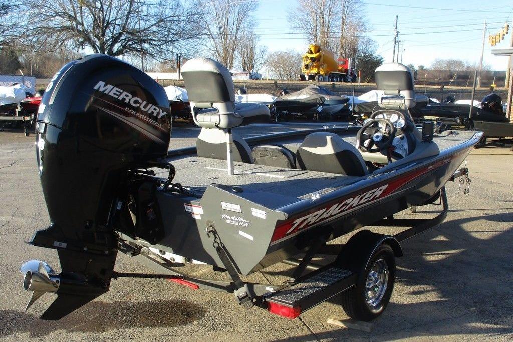 2017 Tracker Pro Team 195 TXW boat with Mercury engine, parked outdoors.