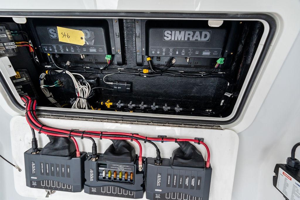 Electrical panel of 2021 Yellowfin 36 Offshore boat with Simrad equipment.