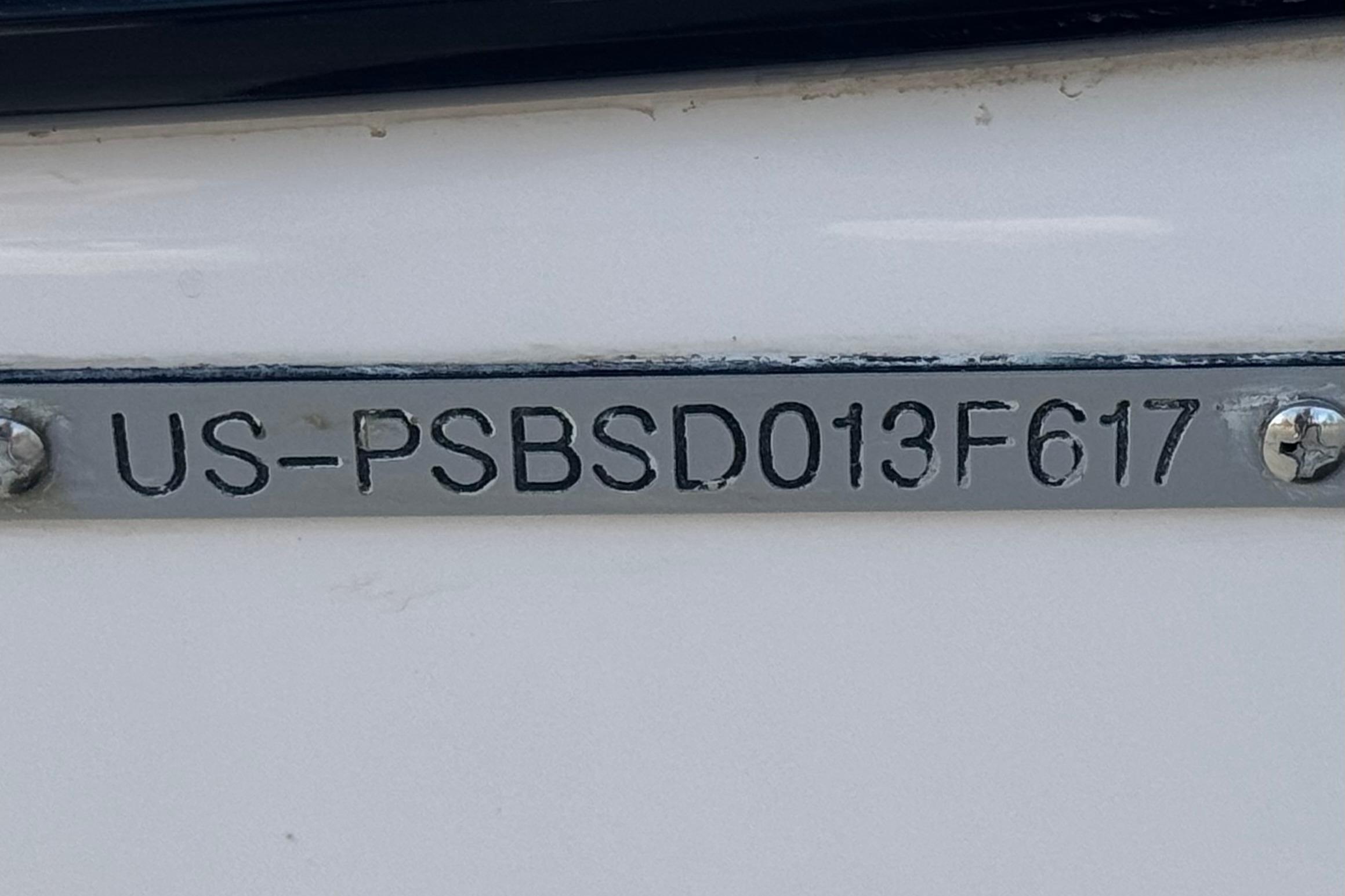2017 Scarab 255 H.O. Platinum boat hull identification number plate.