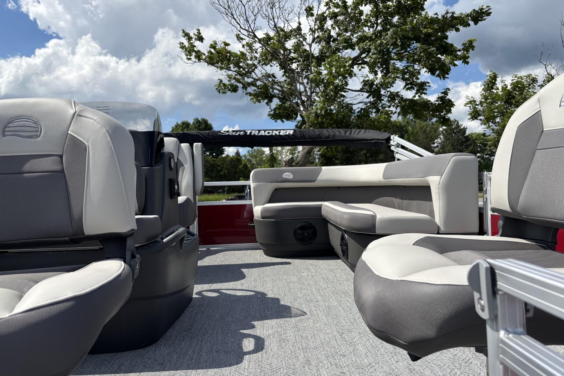 2026 Sun Tracker Bass Buggy 16 XL Select pontoon boat interior with plush seating.