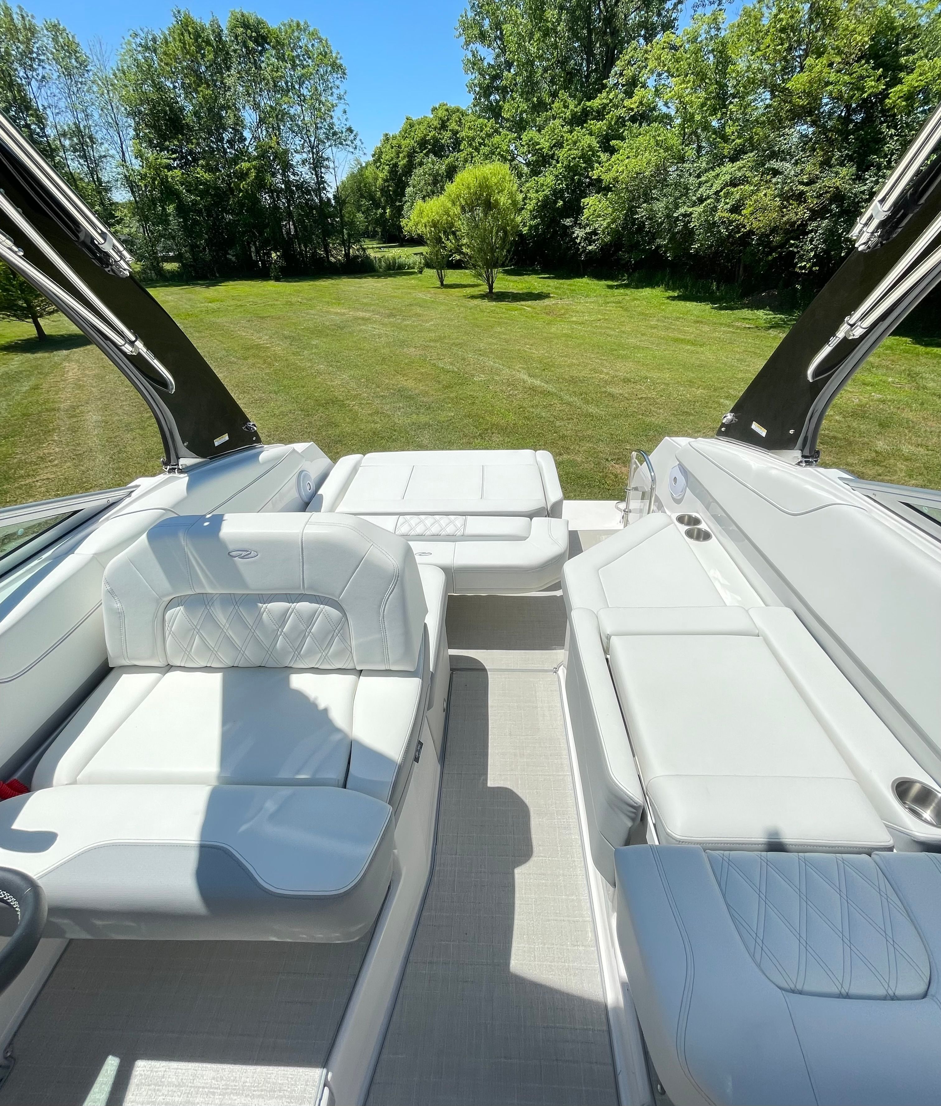Interior of a 2022 Regal 26 Express boat with white seating.