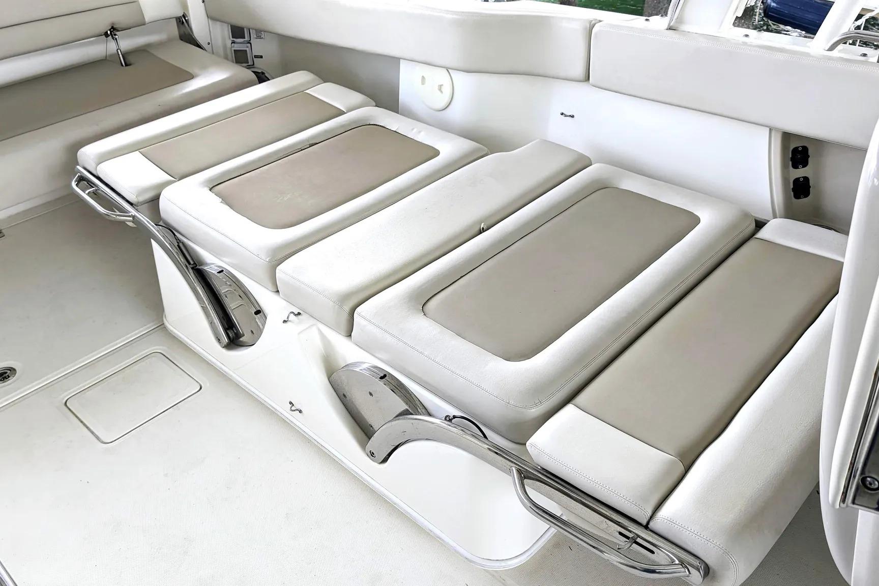 2017 Boston Whaler 320 Vantage boat interior with cushioned seating and sleek design.
