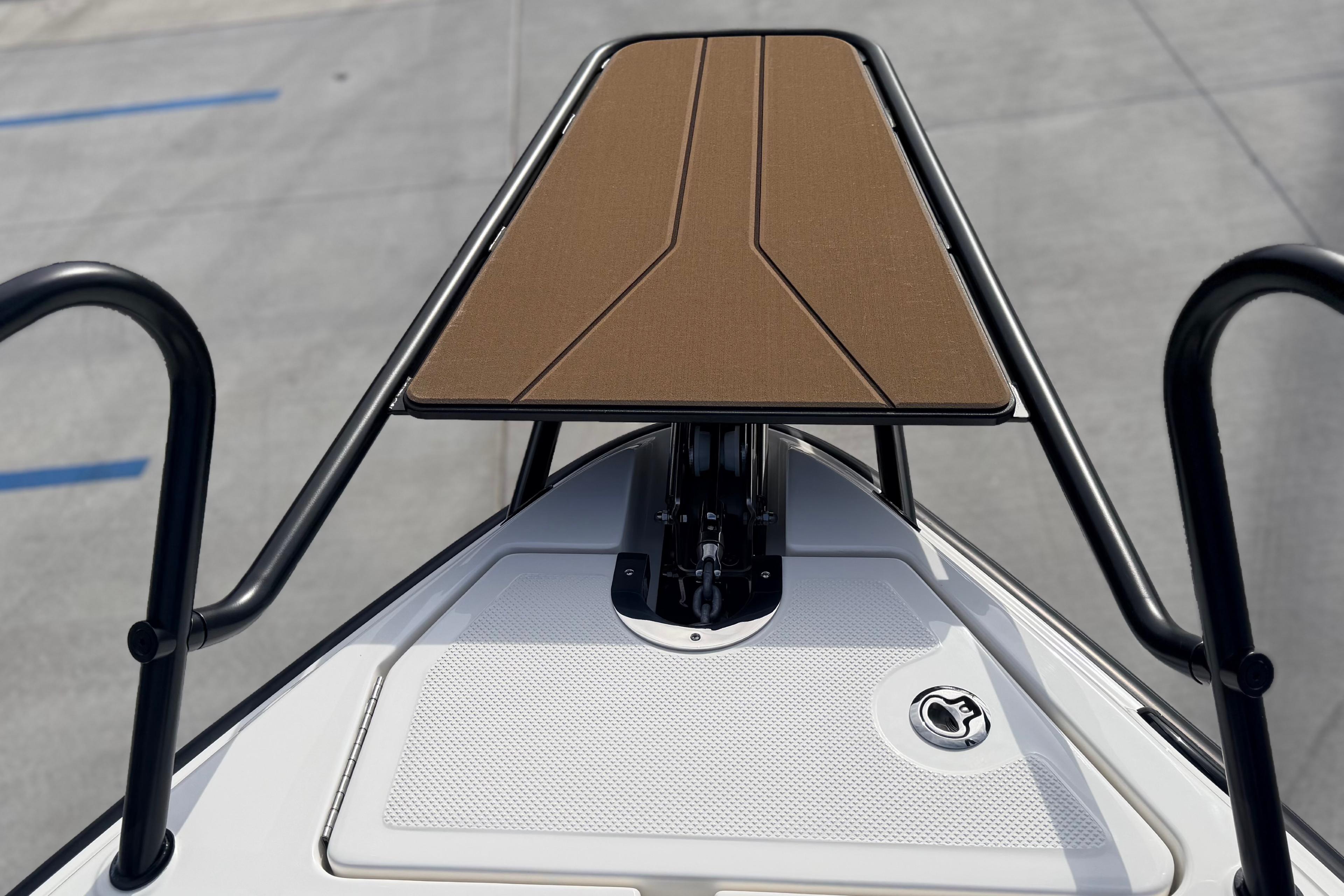 Bow of 2026 Navan S30 boat with sleek design and brown deck.