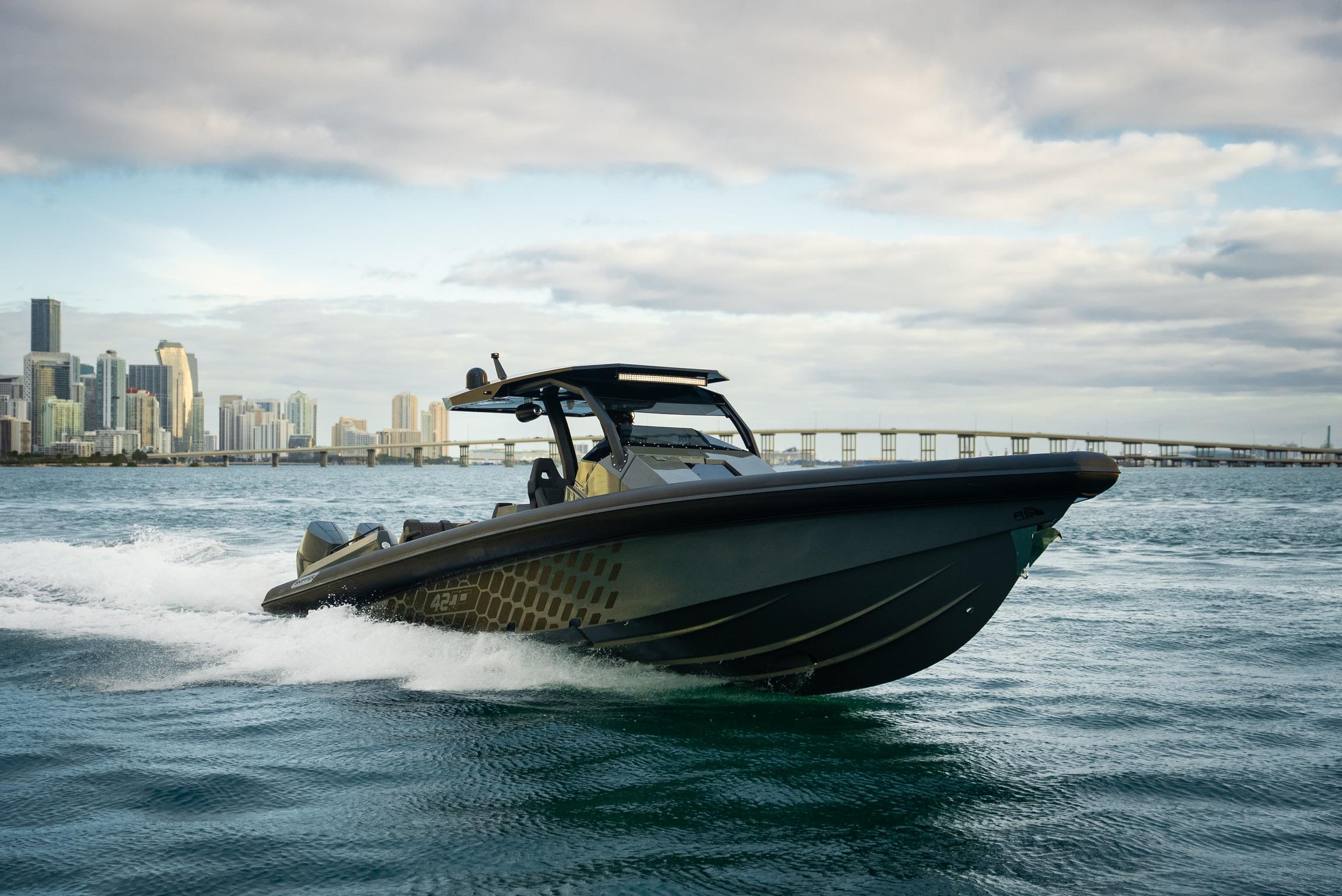 2024 Skipper-BSK 42 boat cruising on water with city skyline in background.