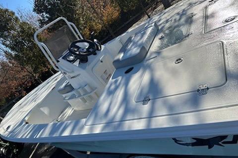 2026 Mako 18 Pro Skiff boat with spacious deck and steering console.