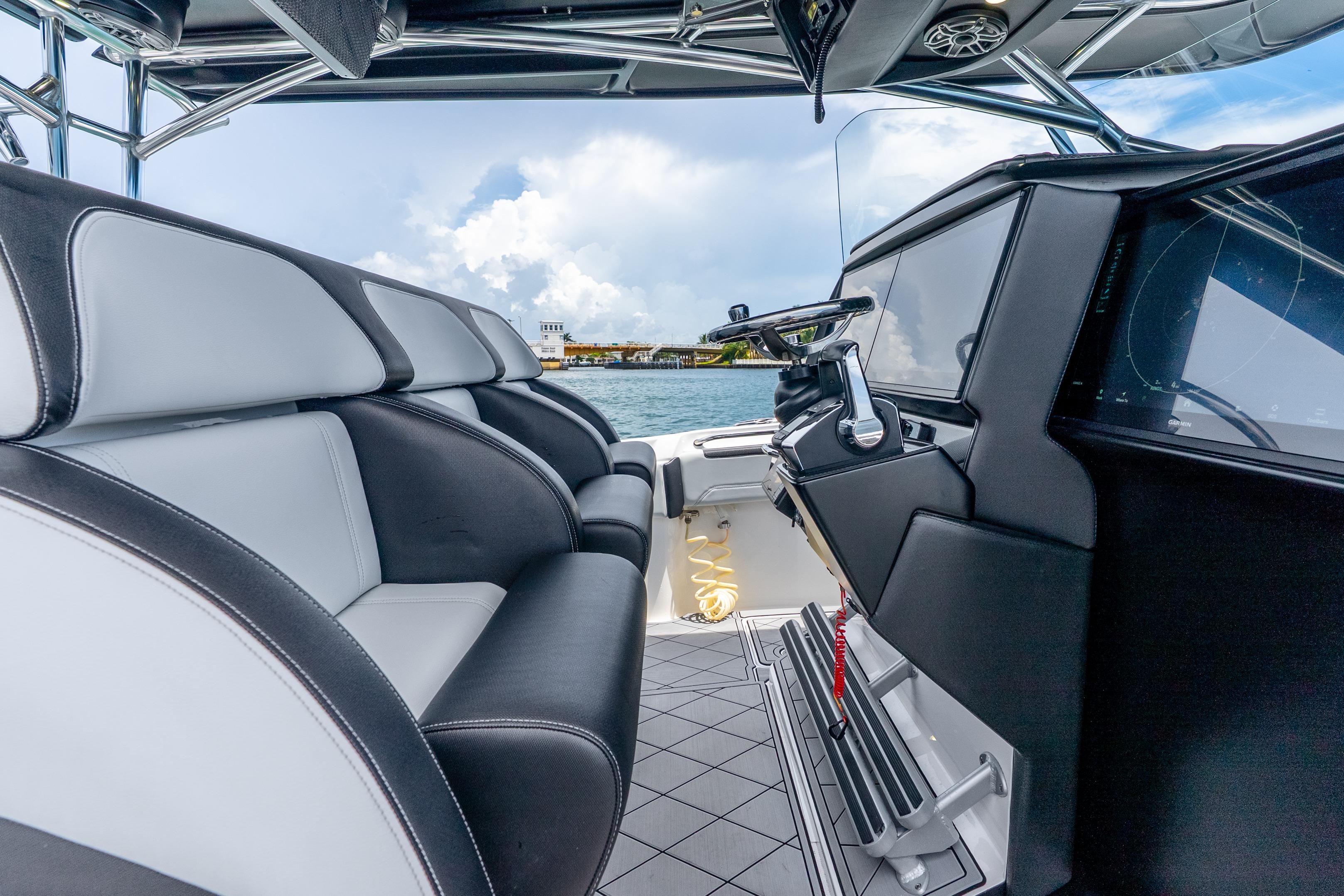 2024 Nor-Tech 452 Super Fish interior with sleek seating and modern helm design.