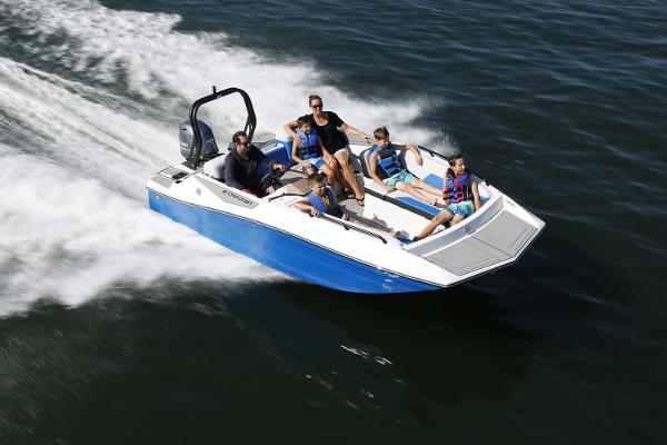 2025 Starcraft SV 16 OB boat cruising with passengers on a sunny day.