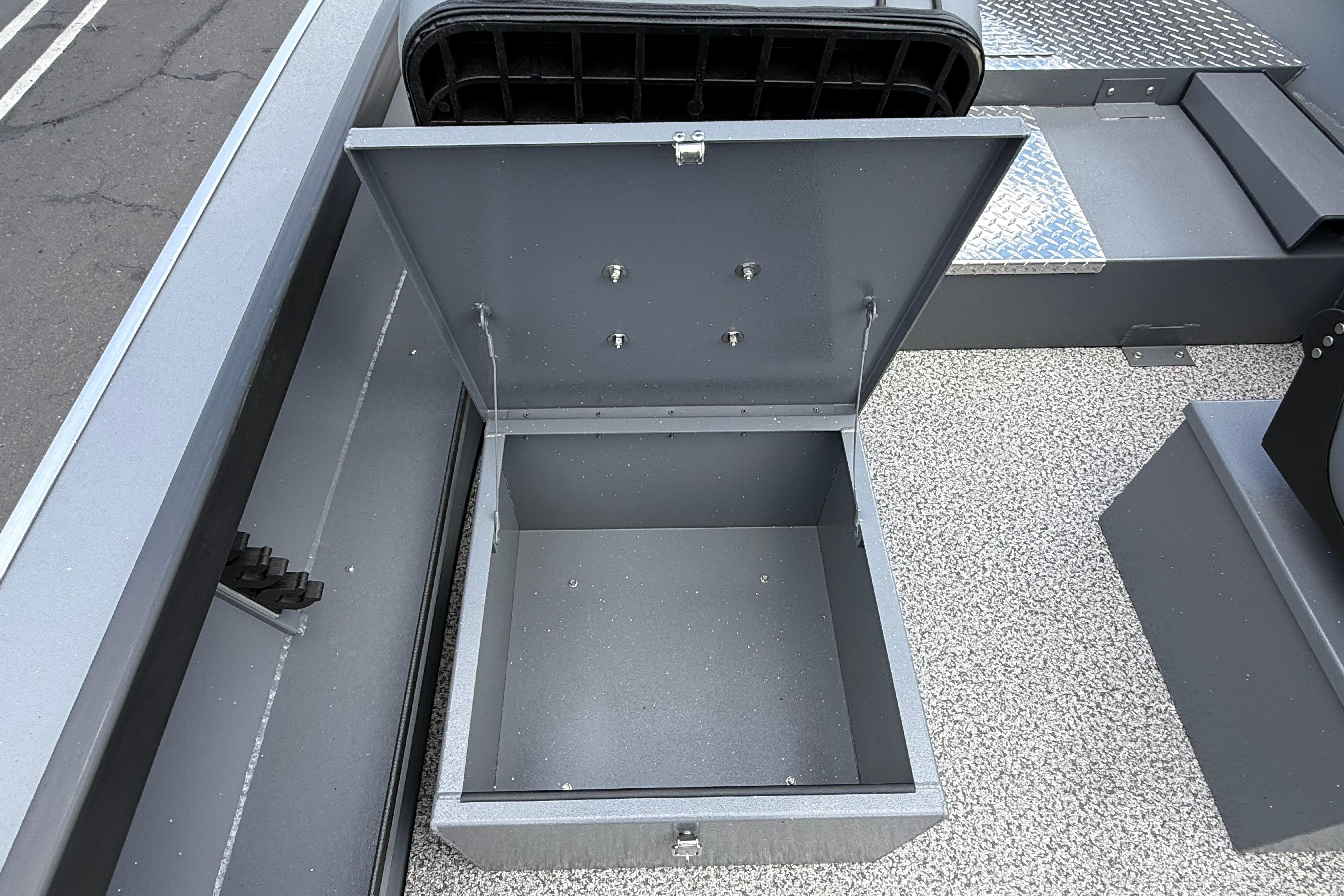 Open storage compartment on 2026 Alumaweld Free Drifter 20 boat deck.