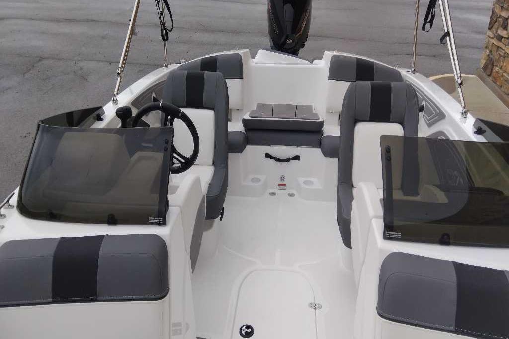 2026 Tahoe T21 boat interior with gray seating and dual windshields.