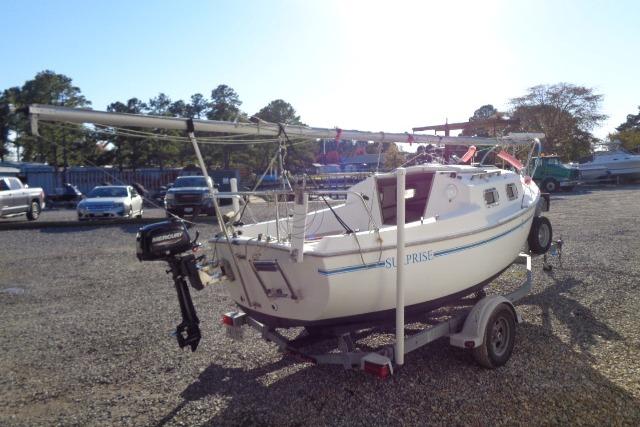 2007 Sanibel by International Marine 18 Pocket Cruiser on trailer in a parking lot.