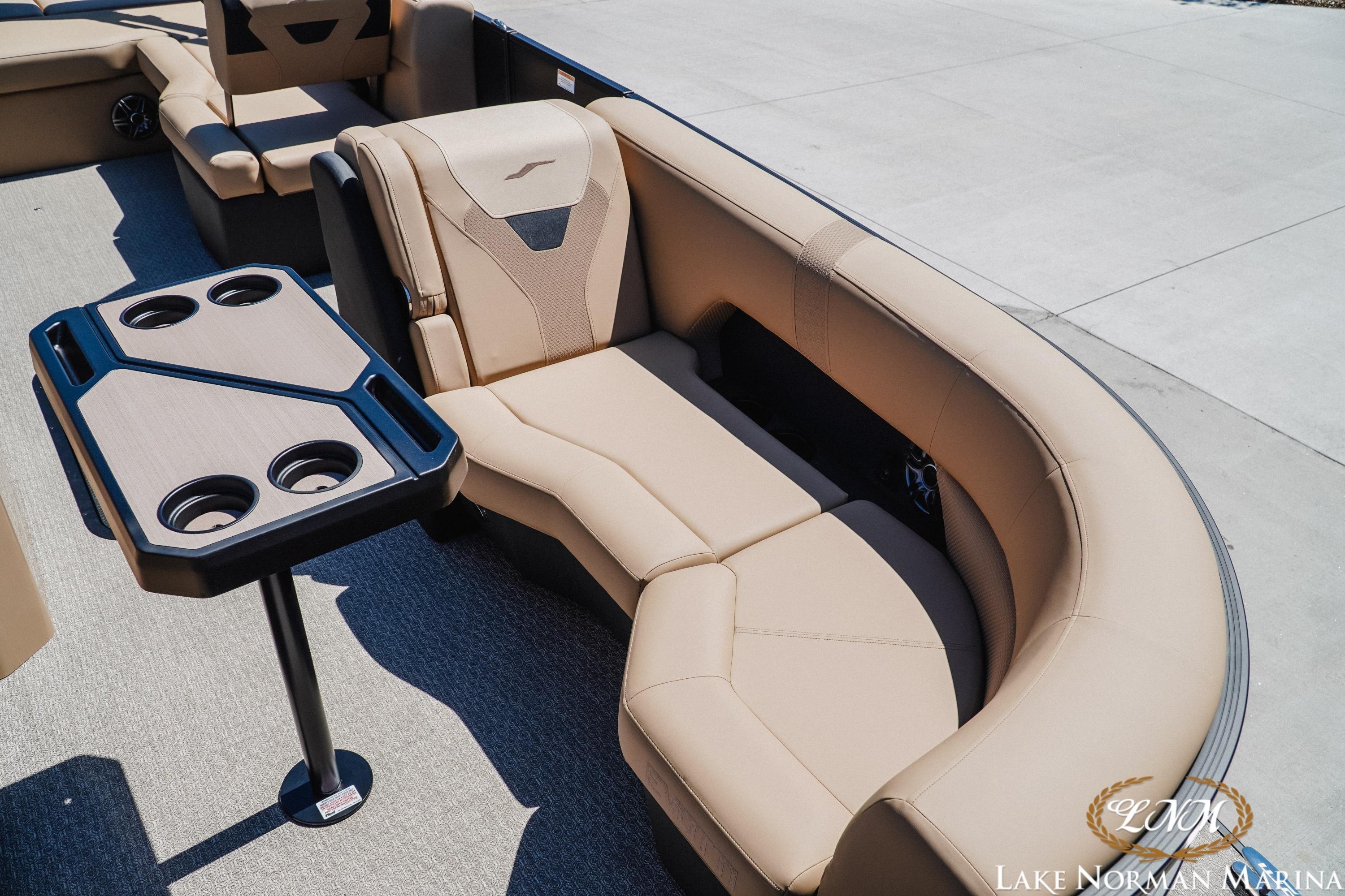 Luxurious seating on 2026 Evotti 523CS boat with cupholders, Lake Norman Marina.