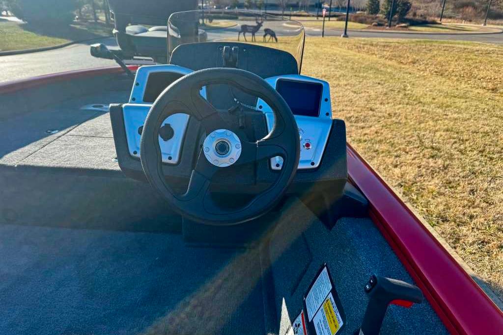 2026 Tracker Pro Team 175 Crappie Edition boat dashboard with steering wheel and controls.