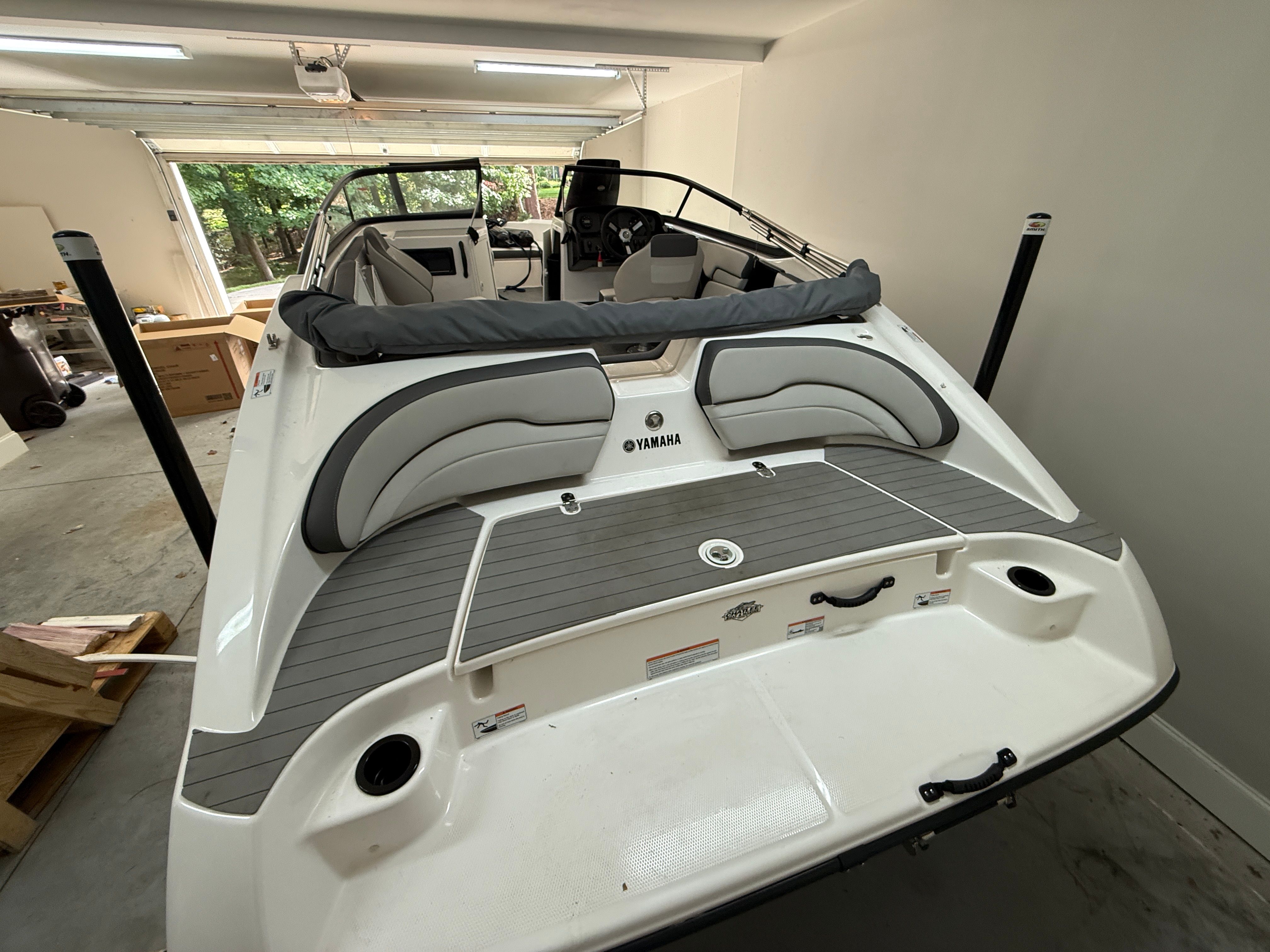 Yamaha SX190 2023 boat inside a garage.
