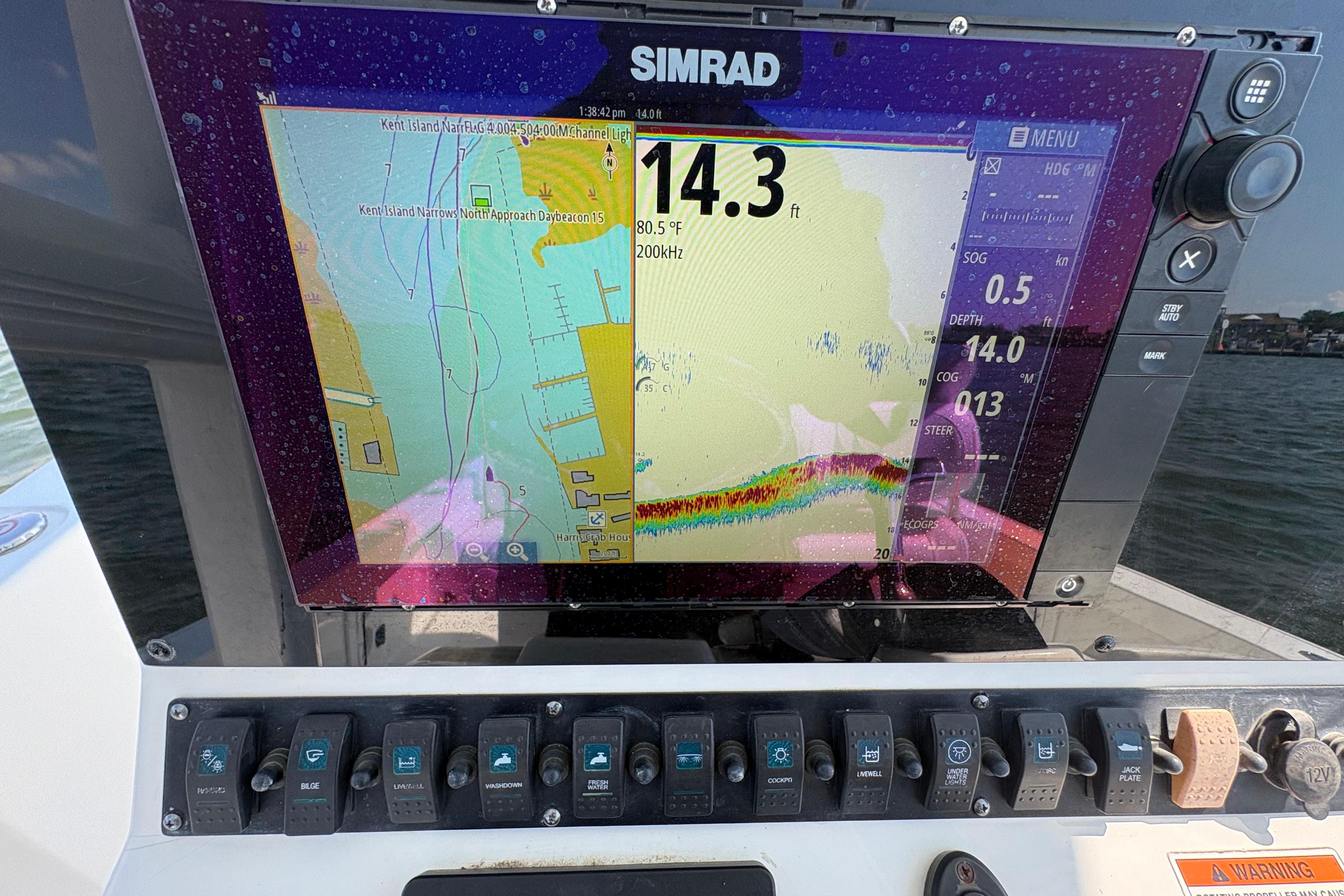 Simrad navigation display on 2017 Sea Hunt BX 25 BR boat dashboard.