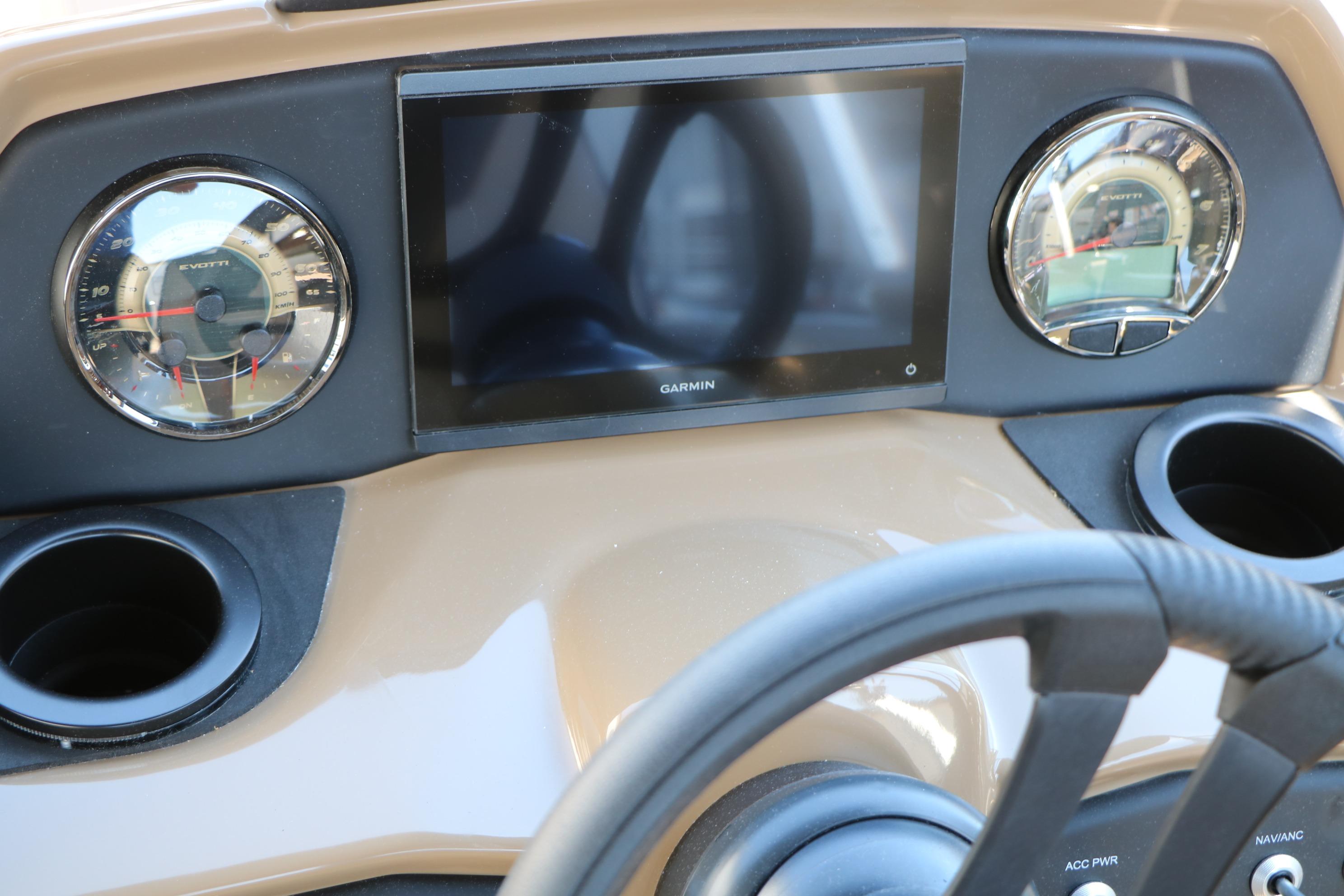 Dashboard of 2026 Evotti 521CS with Garmin display and gauges.
