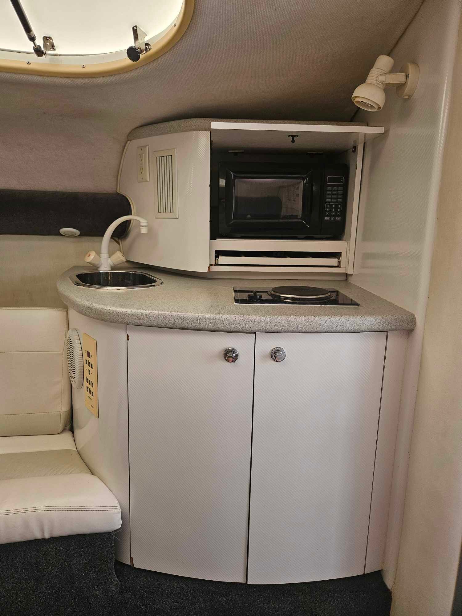 Interior of 1997 Baja 38 Special Boss with kitchenette and microwave.