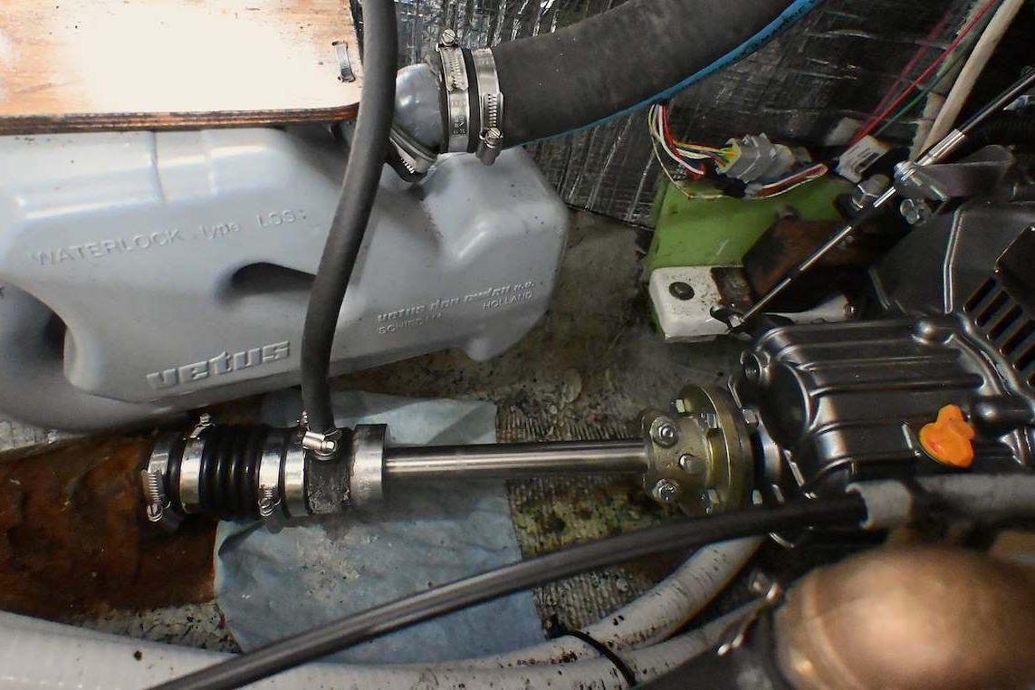 Engine compartment of a 1977 Mercator Offshore boat, featuring Vetus waterlock system.