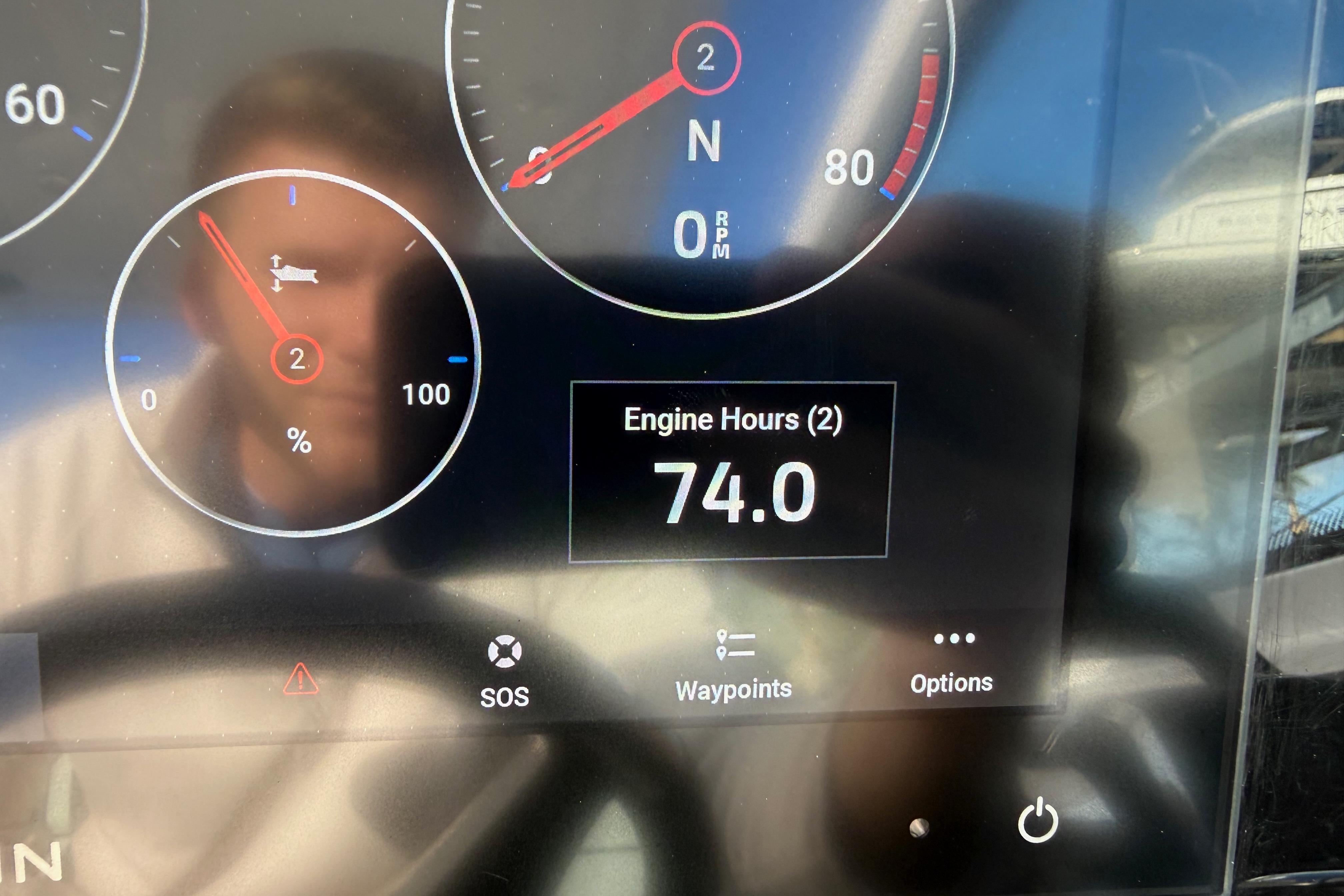 Dashboard of 2022 Blackfin 272 DC showing 74 engine hours.