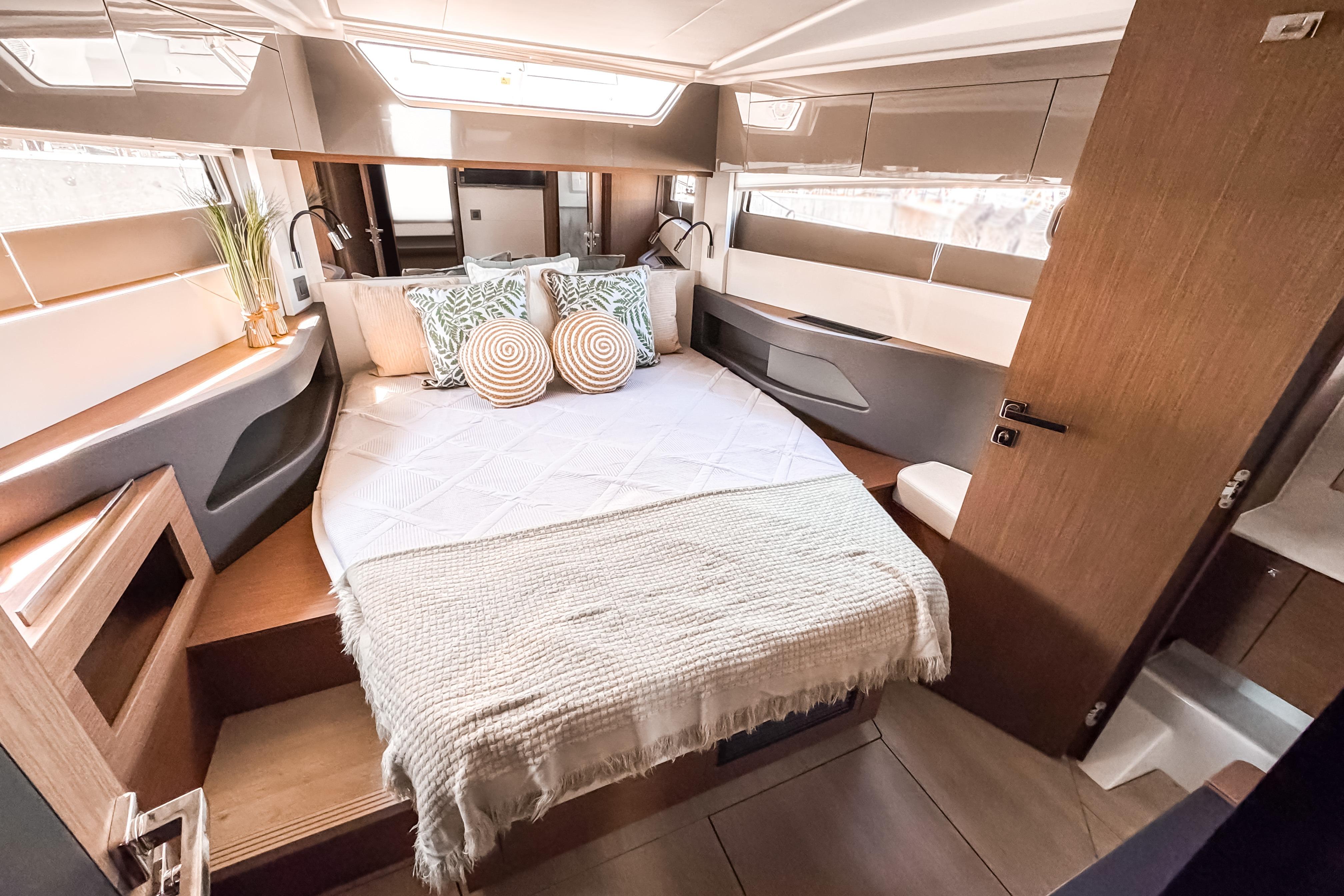 Interior of Wellcraft 44 Explorer 2026 featuring cozy bedroom.